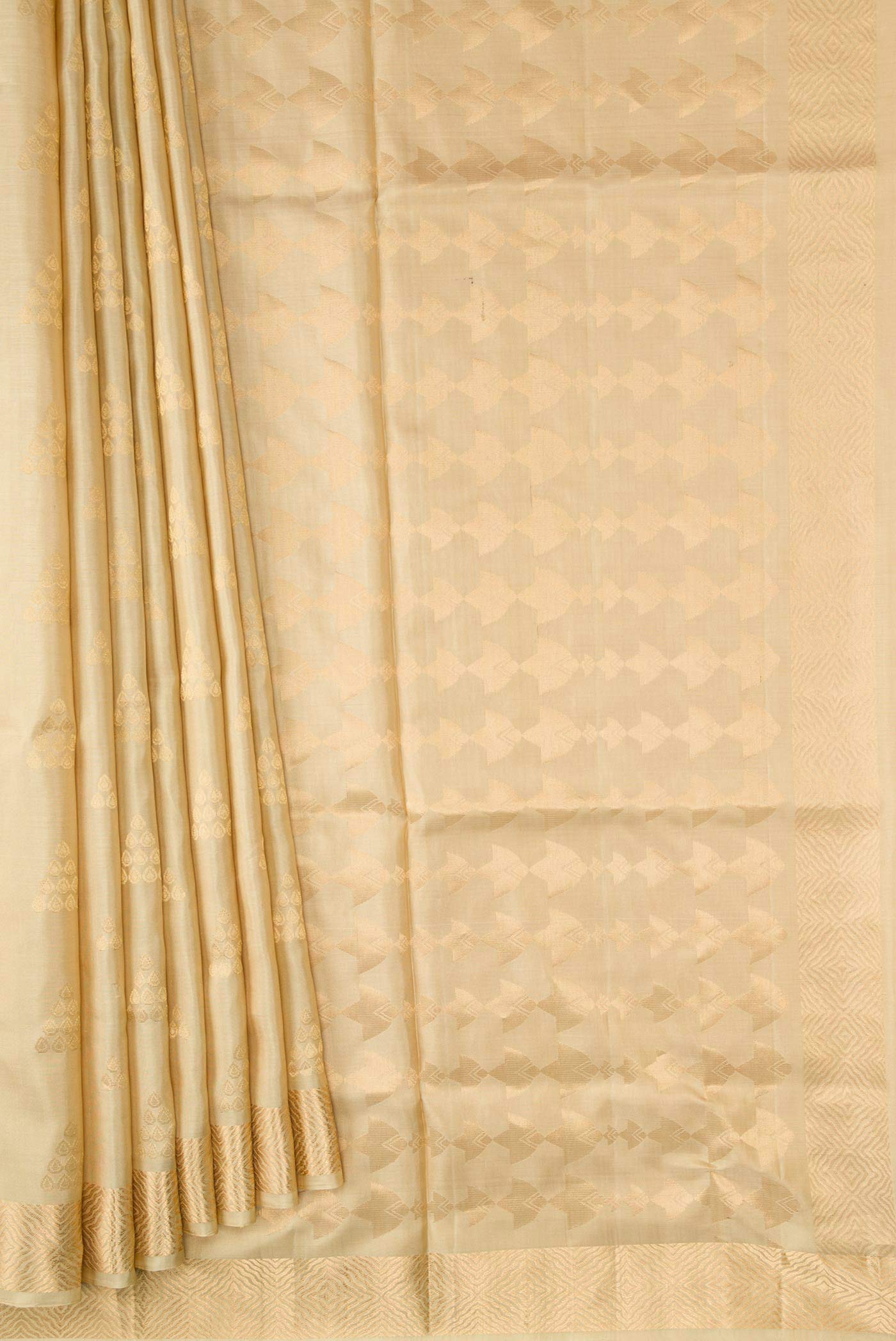 Pleats and pallu of Dark Beige Dual Tone Soft Silk Saree with Zari Butta on the body and Zari Border