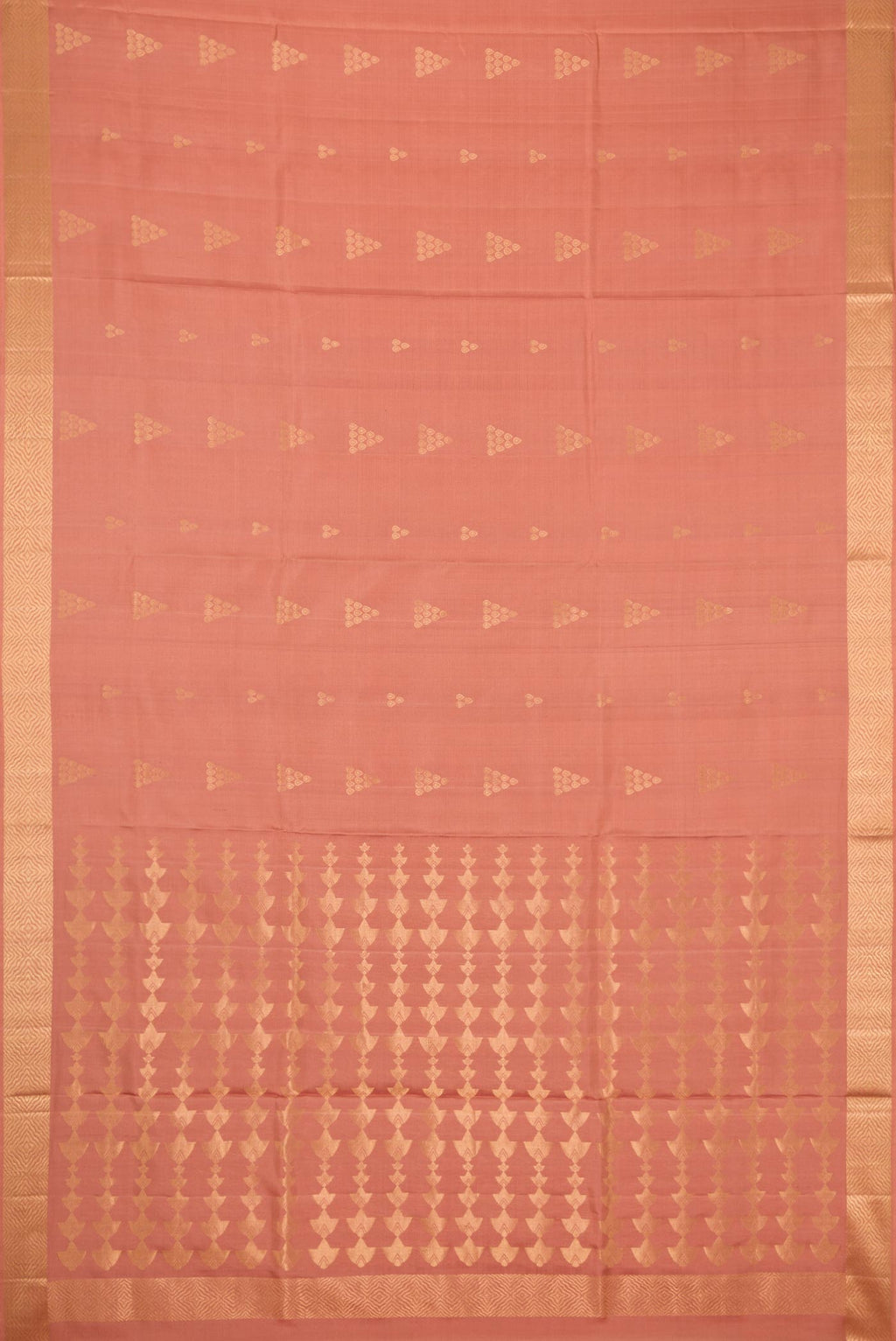 Flat view of Golden Peach Dual Tone Soft Silk Saree with Zari Butta on the body and Zari Border. 