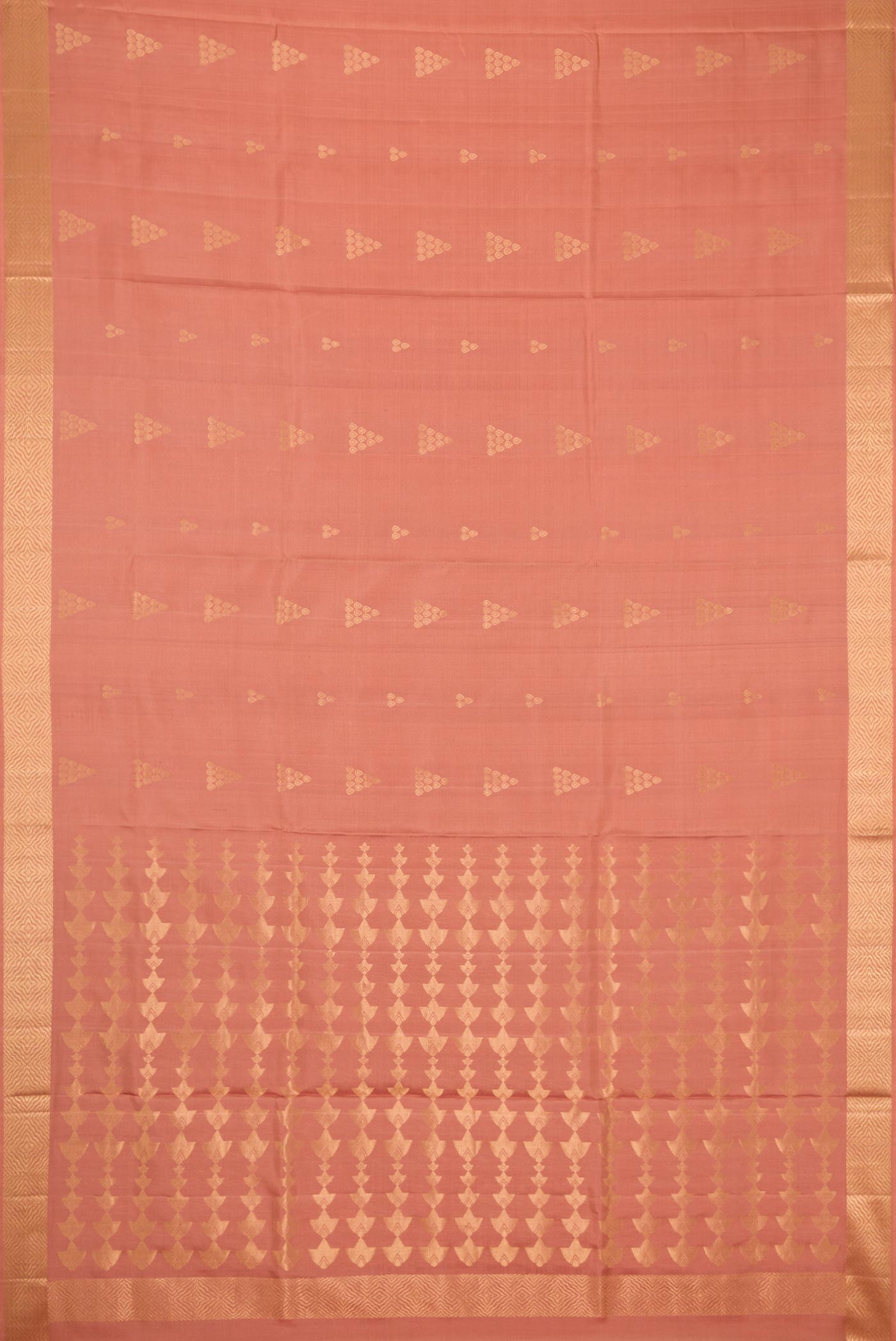 Flat view of Golden Peach Dual Tone Soft Silk Saree with Zari Butta on the body and Zari Border. 