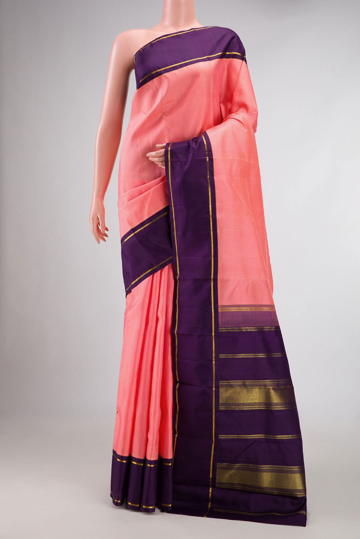 Pure Silk Pure Zari Pink Dual Tone Kanchipuram Saree with Checked design on the body and Zari Border displayed on a mannequin