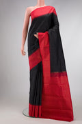 Pure Silk Pure Zari Black Dual Tone Kanchipuram Saree with Plain Body and Checks Border.  displayed on a mannequin