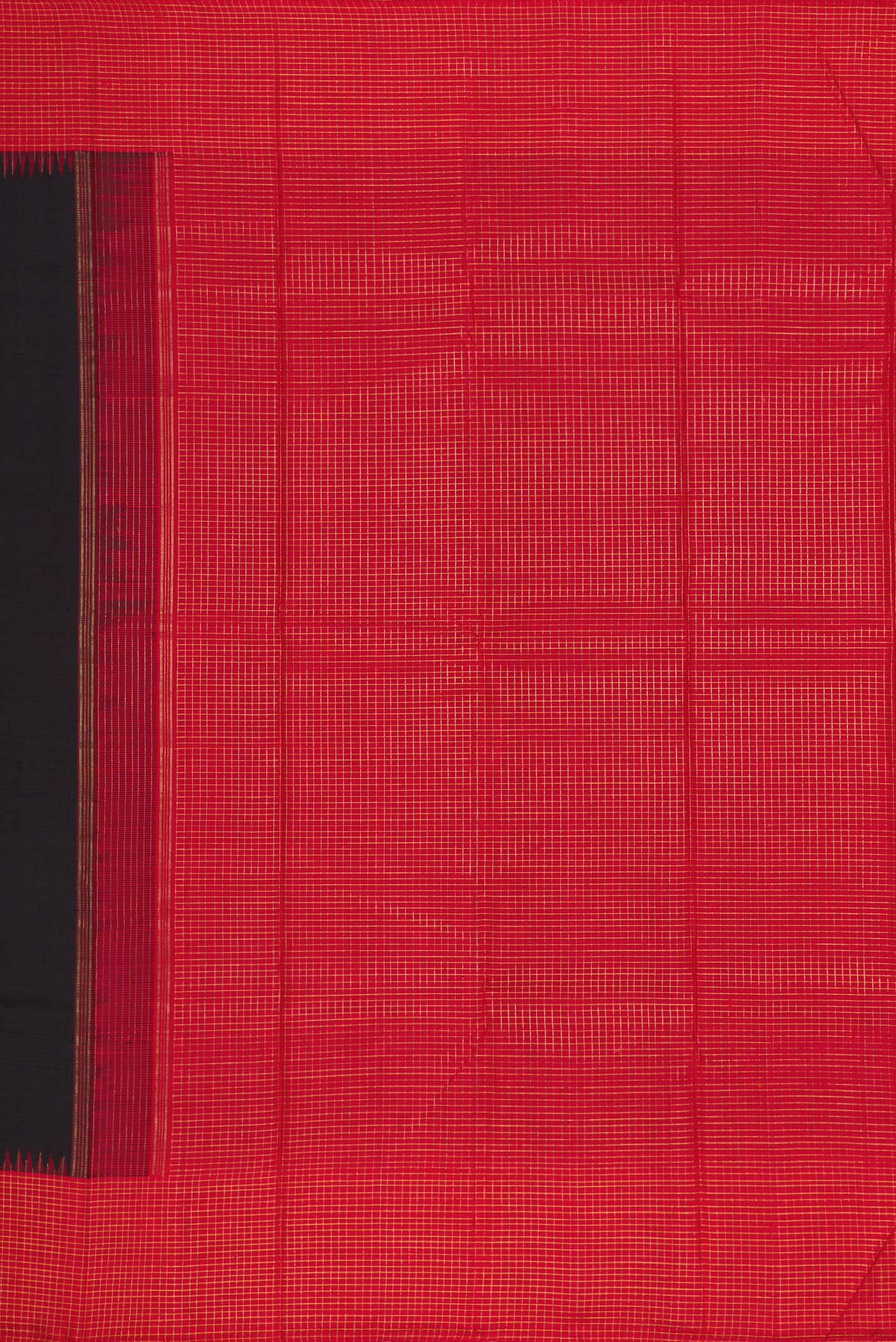 Close up image of the pallu of Pure Silk Pure Zari Black Dual Tone Kanchipuram Saree with Plain Body and Checks Border. 