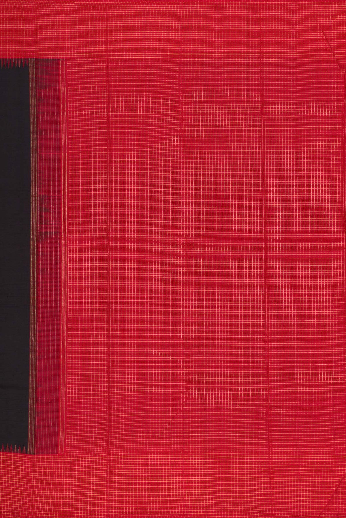 Close up image of the pallu of Pure Silk Pure Zari Black Dual Tone Kanchipuram Saree with Plain Body and Checks Border. 