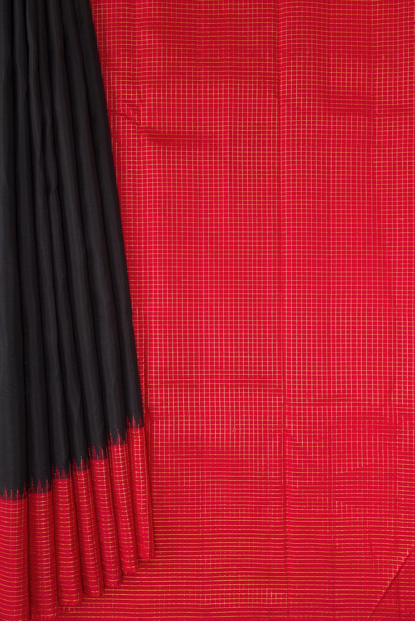 Pleats and pallu of Pure Silk Pure Zari Black Dual Tone Kanchipuram Saree with Plain Body and Checks Border. 