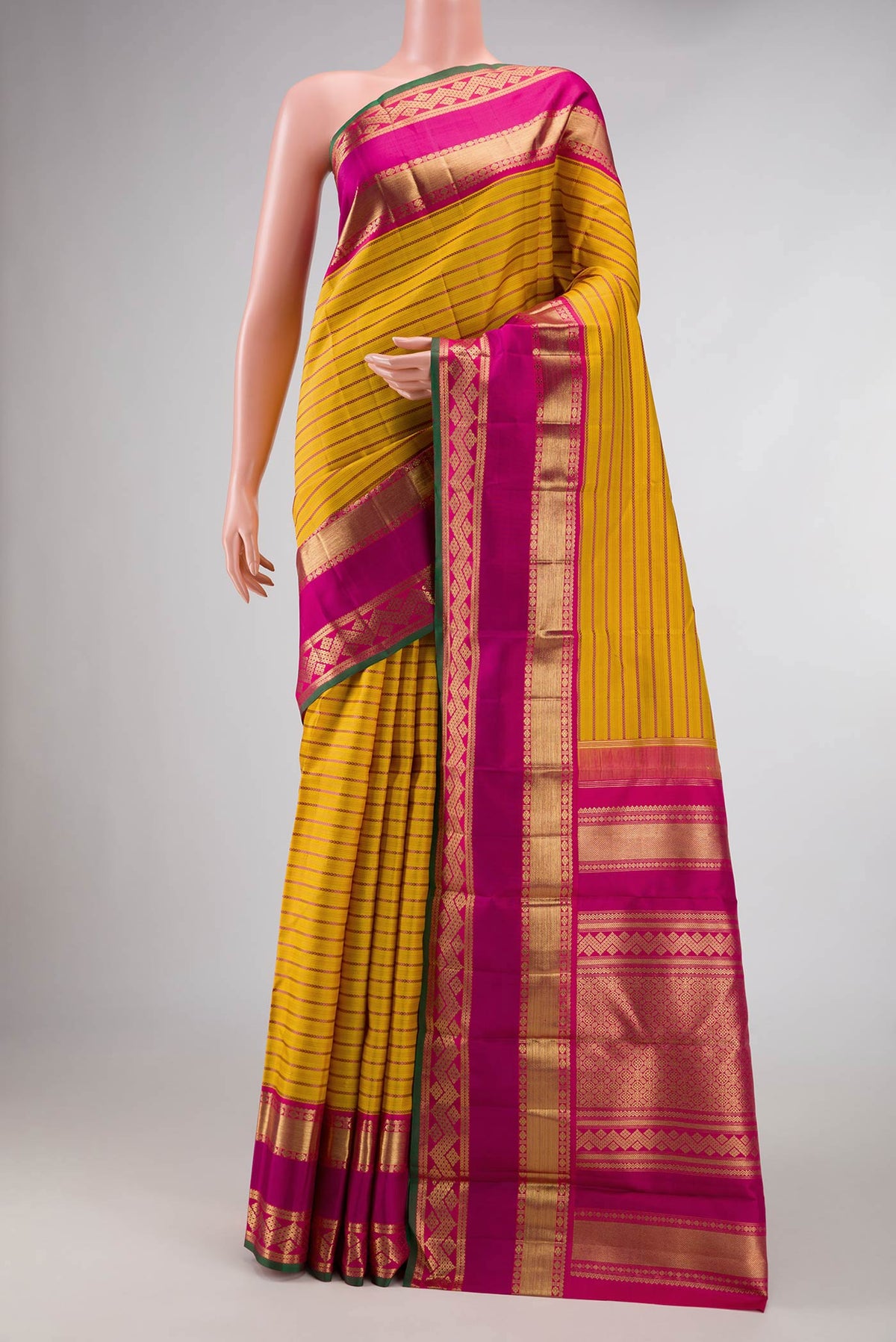 Pure Silk Pure Zari Mustard Dual Tone Kanchipuram Saree with Veldhari on the body and Zari Border displayed on a mannequin