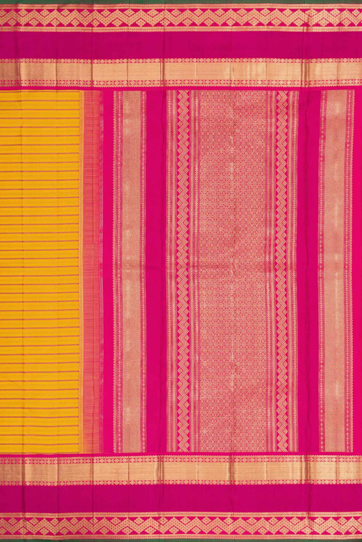 Close up image of the pallu of Pure Silk Pure Zari Mustard Dual Tone Kanchipuram Saree with Veldhari on the body and Zari Border