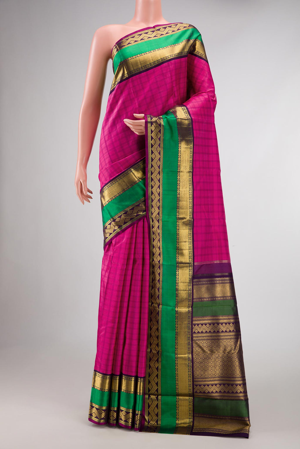 Pure Silk Pure Zari Pink Dual Tone Kanchipuram Saree with Checked design on the body and Zari Border displayed on a mannequin
