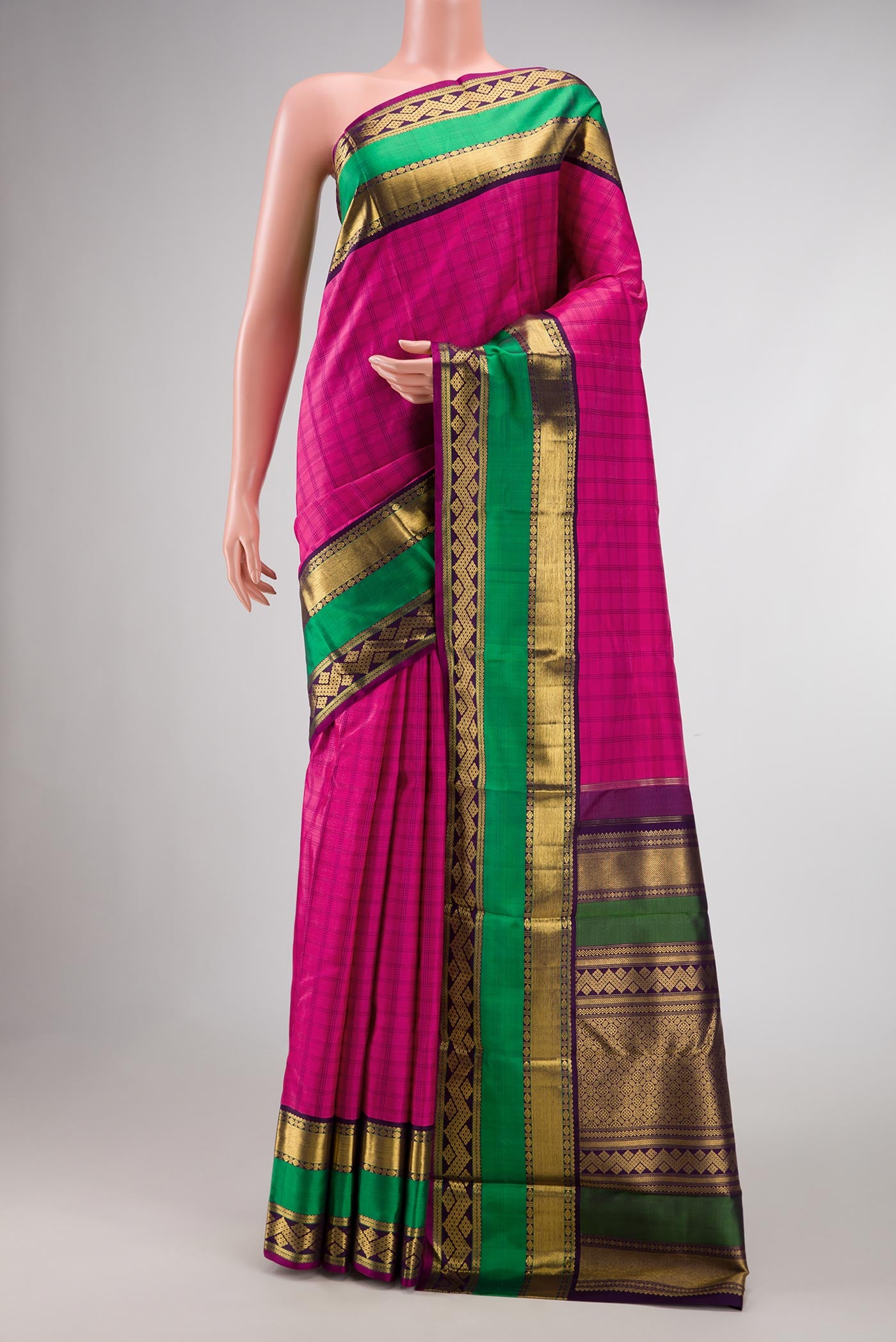 Pure Silk Pure Zari Pink Dual Tone Kanchipuram Saree with Checked design on the body and Zari Border displayed on a mannequin