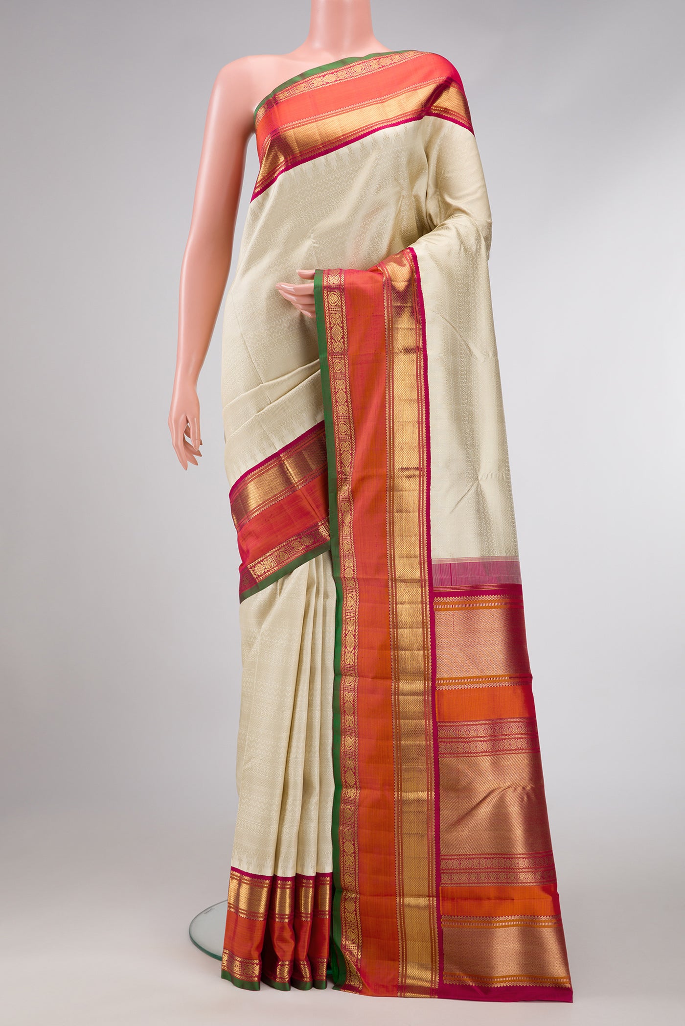 Off White Dual Tone Kanjivaram Silk Saree with Jacquard design on the body and Zari Border.  displayed on a mannequin