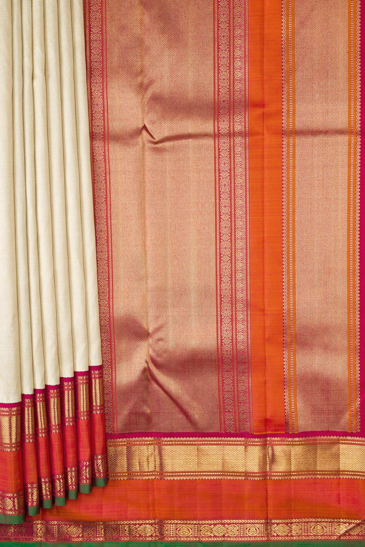 Pleats and pallu of Off White Dual Tone Kanjivaram Silk Saree with Jacquard design on the body and Zari Border. 
