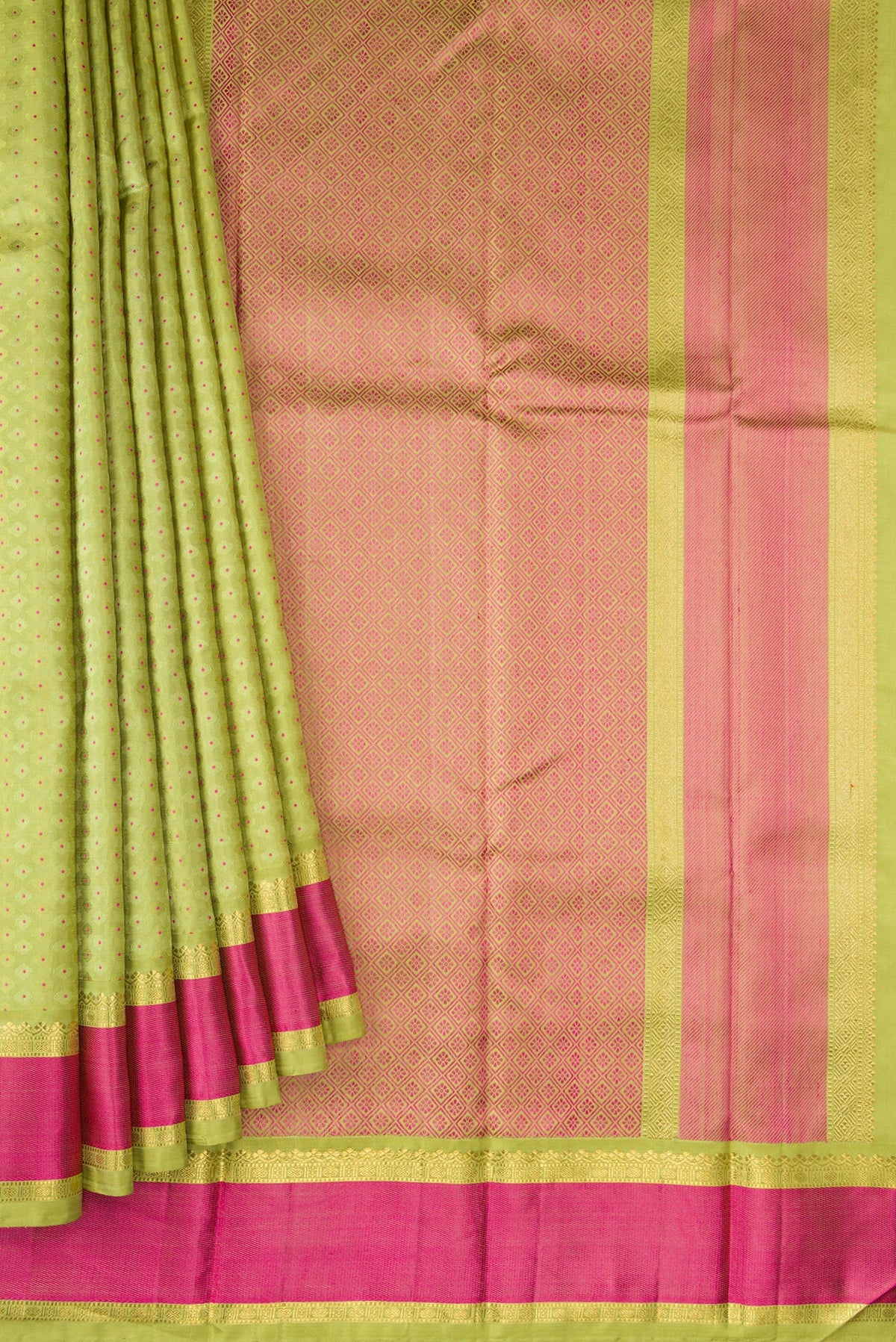 Pleats and pallu of Pure Silk Pure Zari Parrot Green Dual Tone Kanchipuram Saree with Jacquard With Zari Butta on the body and Zari And Thread Border. 