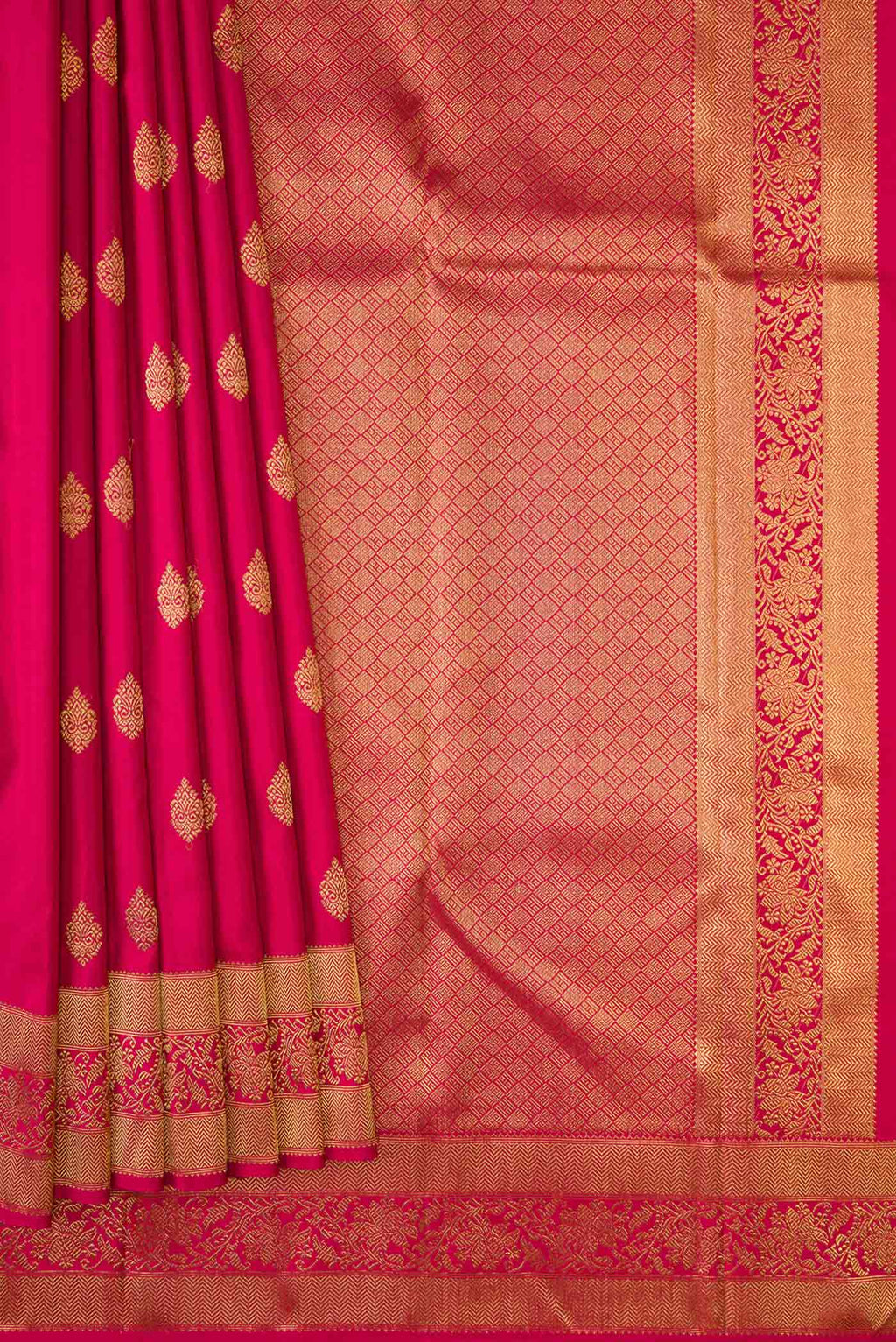 Pleats and pallu of Pure Silk Pure Zari Dark Pink Dual Tone Kanjivaram Saree with Zari Butta on the body and Zari Border. 