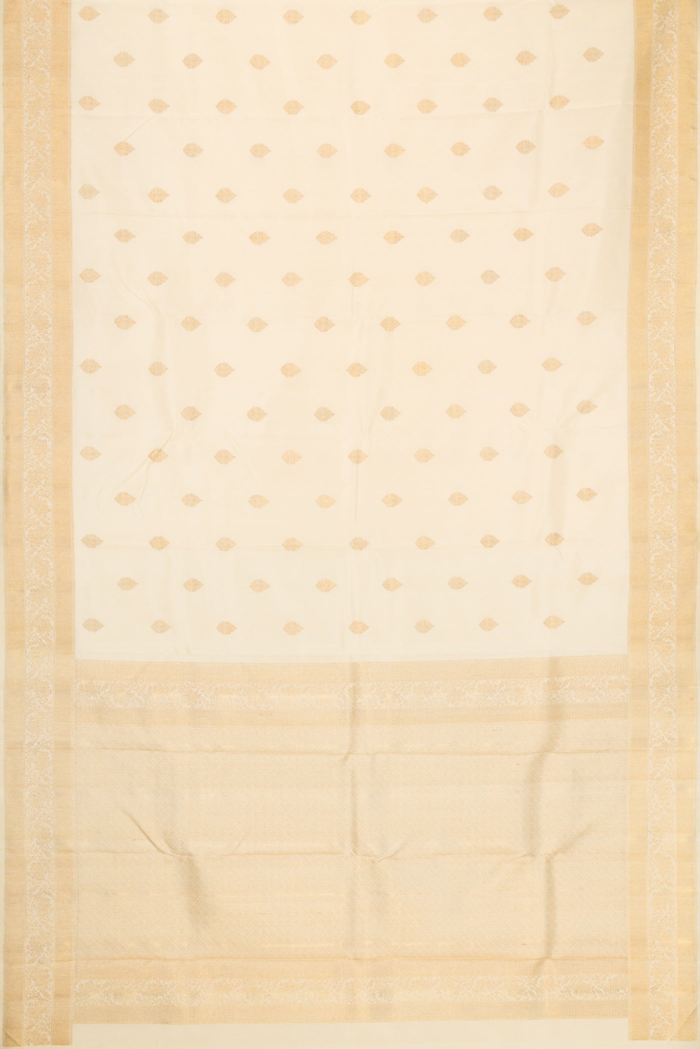Flat view of Pure Silk Pure Zari Off White Dual Tone Kanjivaram Saree with Zari Butta on the body and Zari Border. 