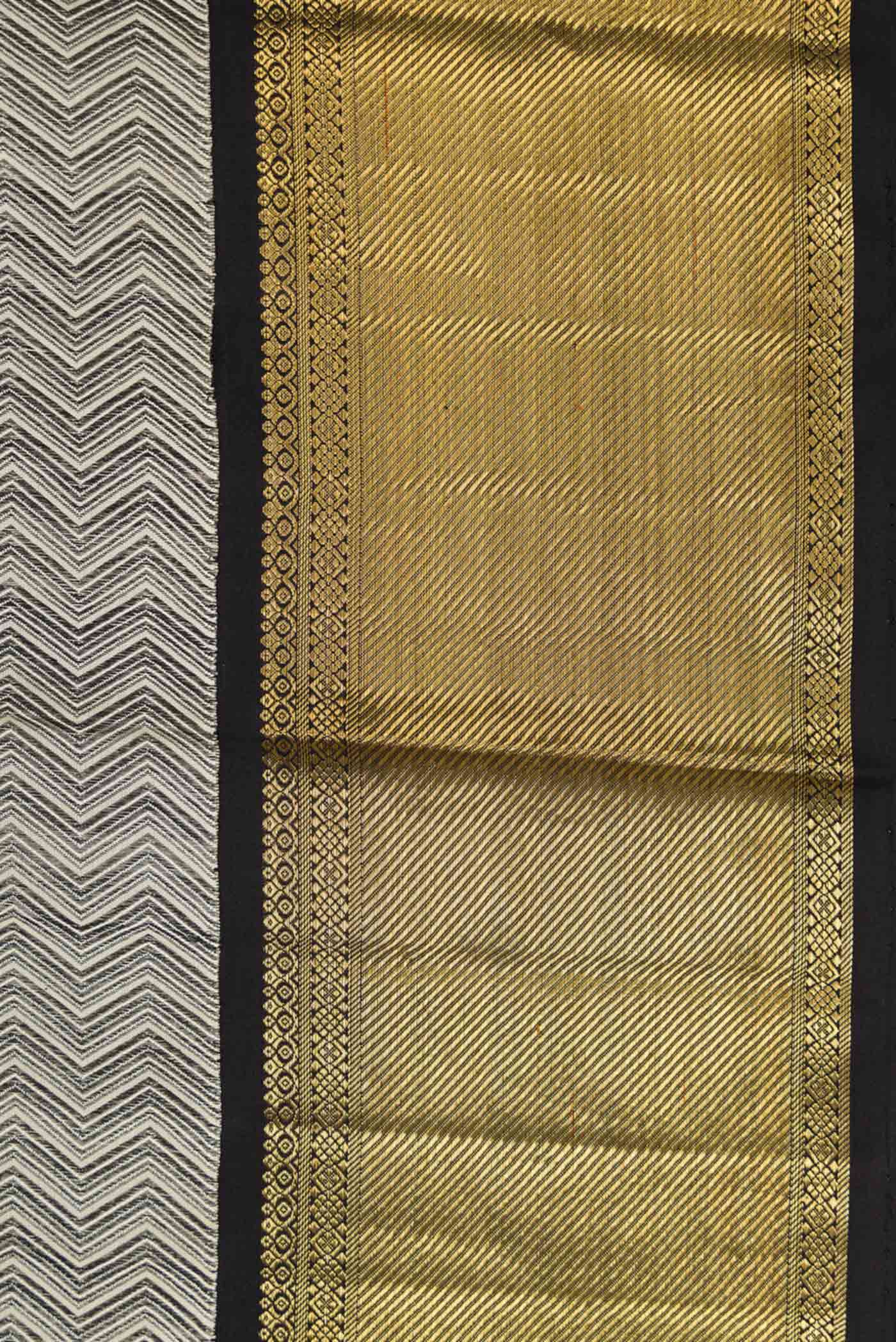 Border image of Pure Silk Pure Zari Grey Dual Tone Kanchipuram Saree with Jacquard design on the body and Zari Border