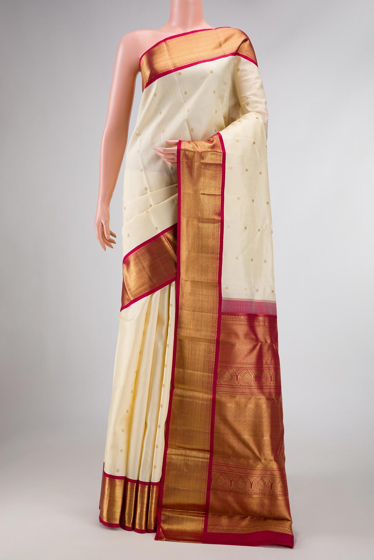 Pure Silk Pure Zari Sandal Dual Tone Kanchipuram Saree with Zari Butta on the body and Zari Border displayed on a mannequin