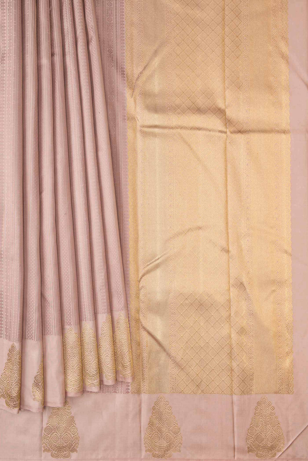 Pleats and pallu of Pure Silk Pure Zari Rose Gold Dual Tone Kanchipuram Saree with Jacquard design on the body and Zari Border. 