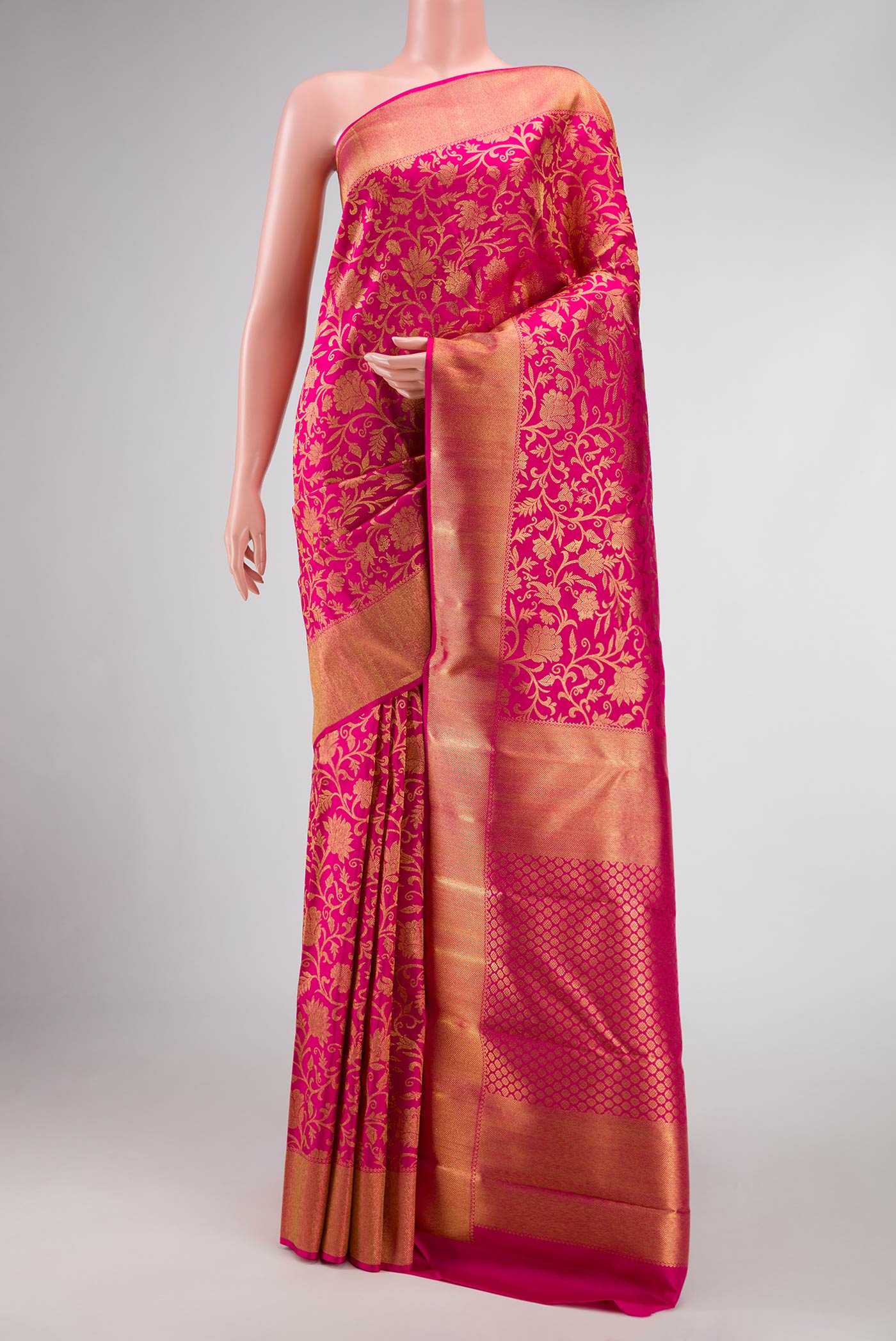 Pure Silk Pure Zari Pink Dual Tone Kanchipuram Saree with Zari Brocade on the body and Zari Border displayed on a mannequin