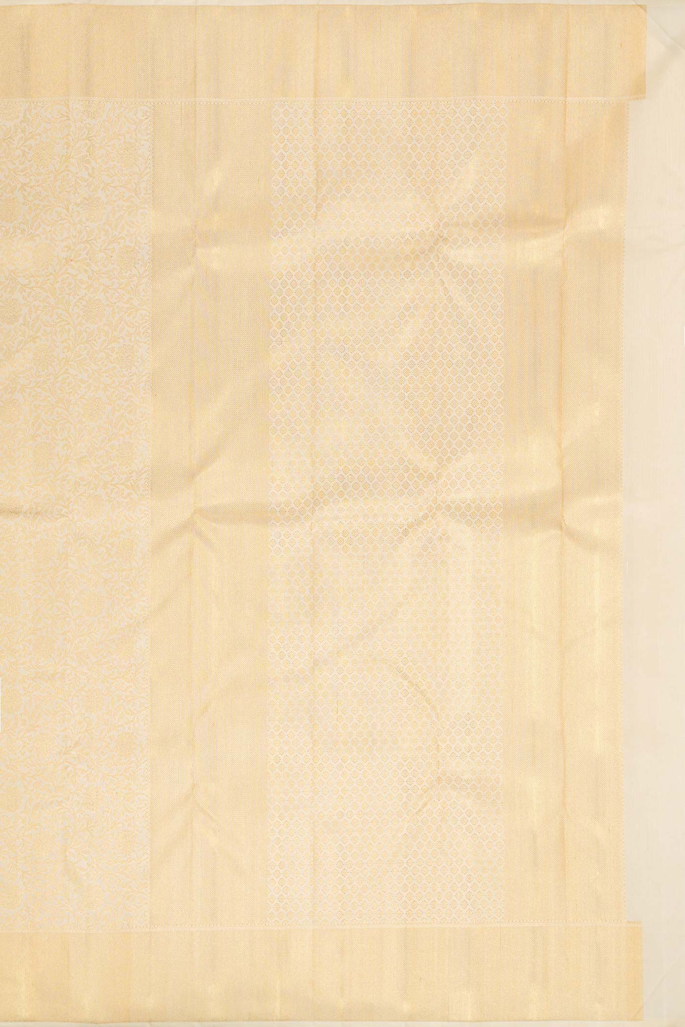 Close up image of the pallu of Pure Silk Pure Zari Off White Dual Tone Kanchipuram Saree with Zari Brocade on the body and Zari Border