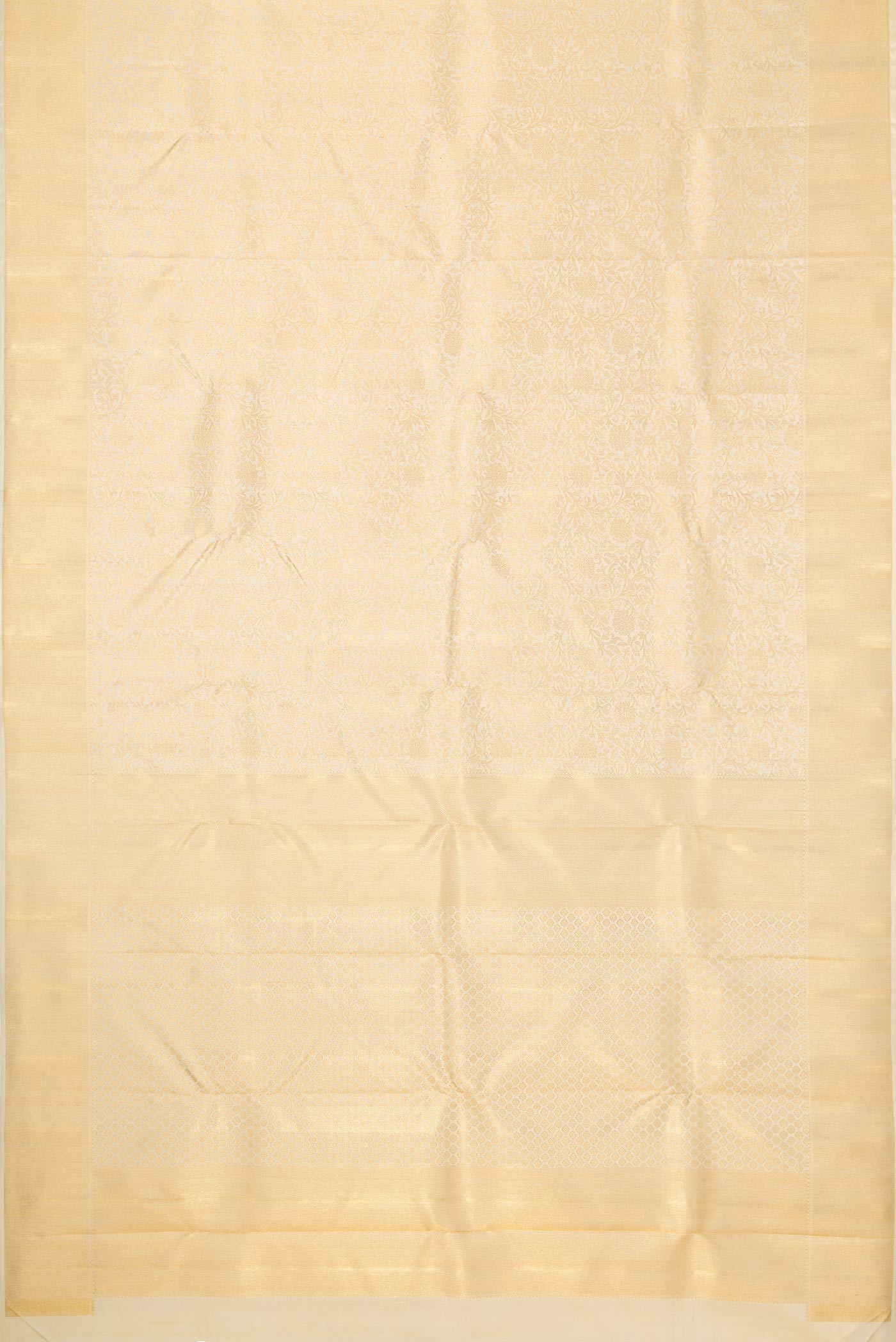 Flat view of Pure Silk Pure Zari Off White Dual Tone Kanchipuram Saree with Zari Brocade on the body and Zari Border