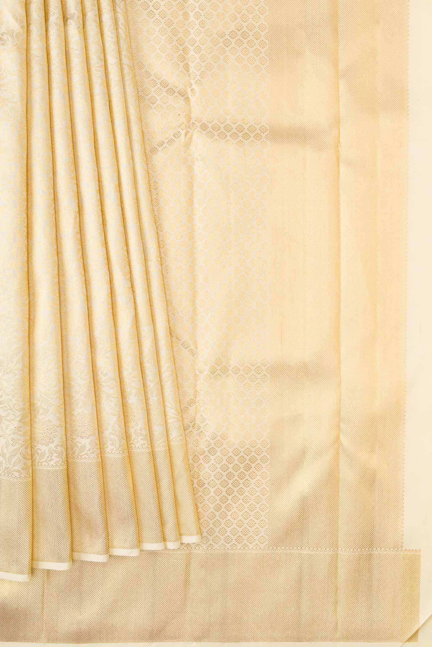 Pleats and pallu of Pure Silk Pure Zari Off White Dual Tone Kanchipuram Saree with Zari Brocade on the body and Zari Border