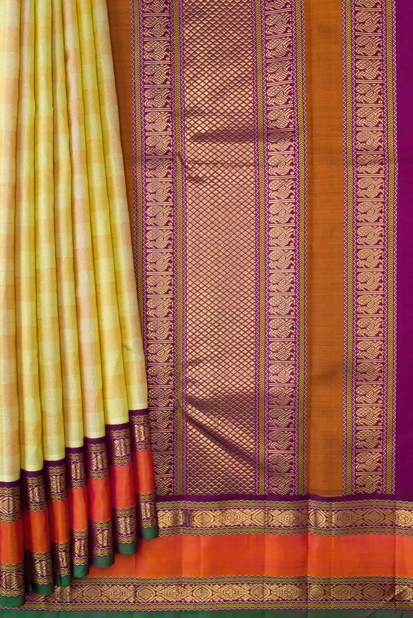 Pleats and pallu of Pure Silk Pure Zari Lemon Yellow and Mustard Color Kanchipuram Saree with Checked design on the body and Zari Border