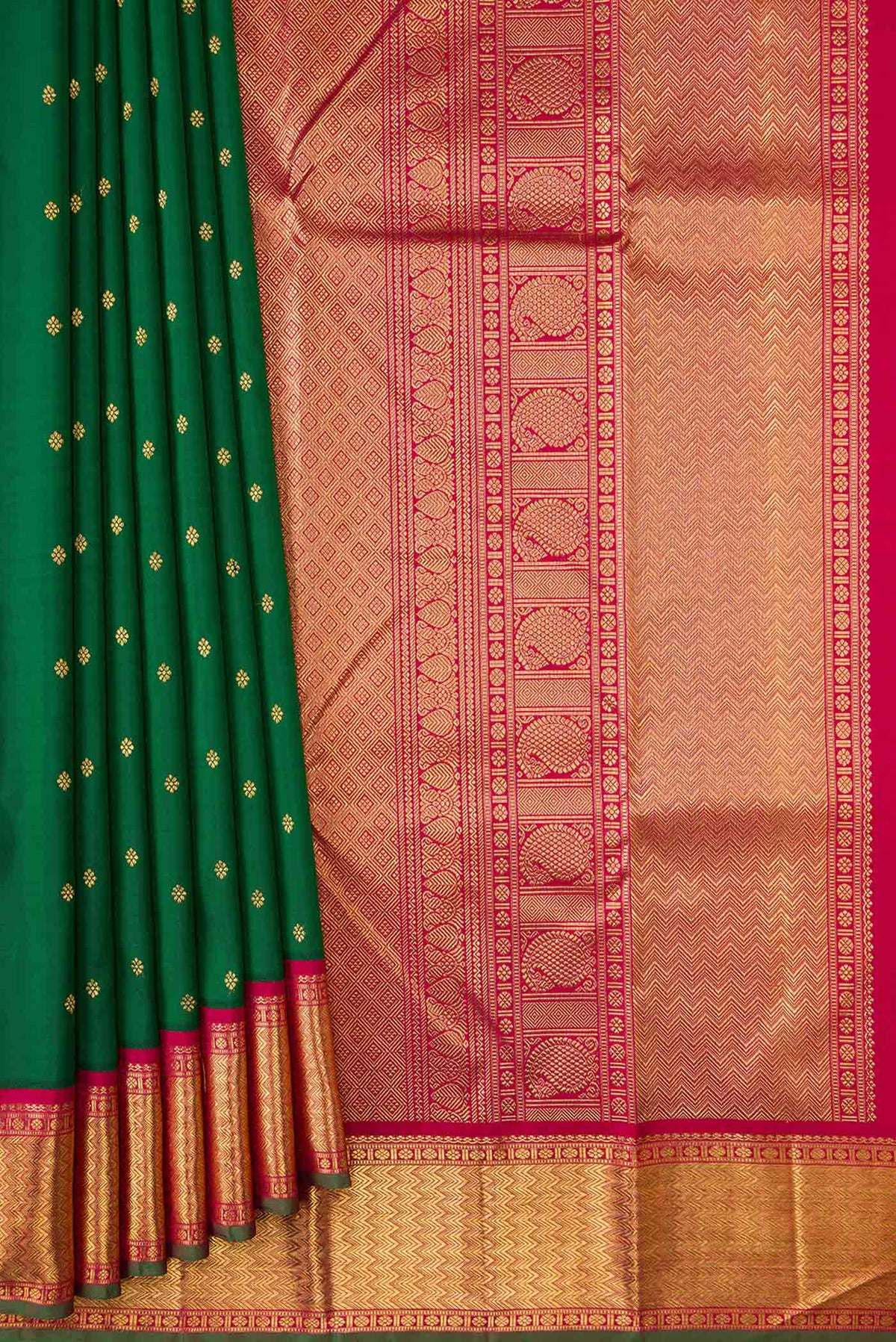 Pleats and pallu of Pure Silk Pure Zari Bottle Green Dual Tone Kanchipuram Saree with Zari Butta on the body and Zari Border