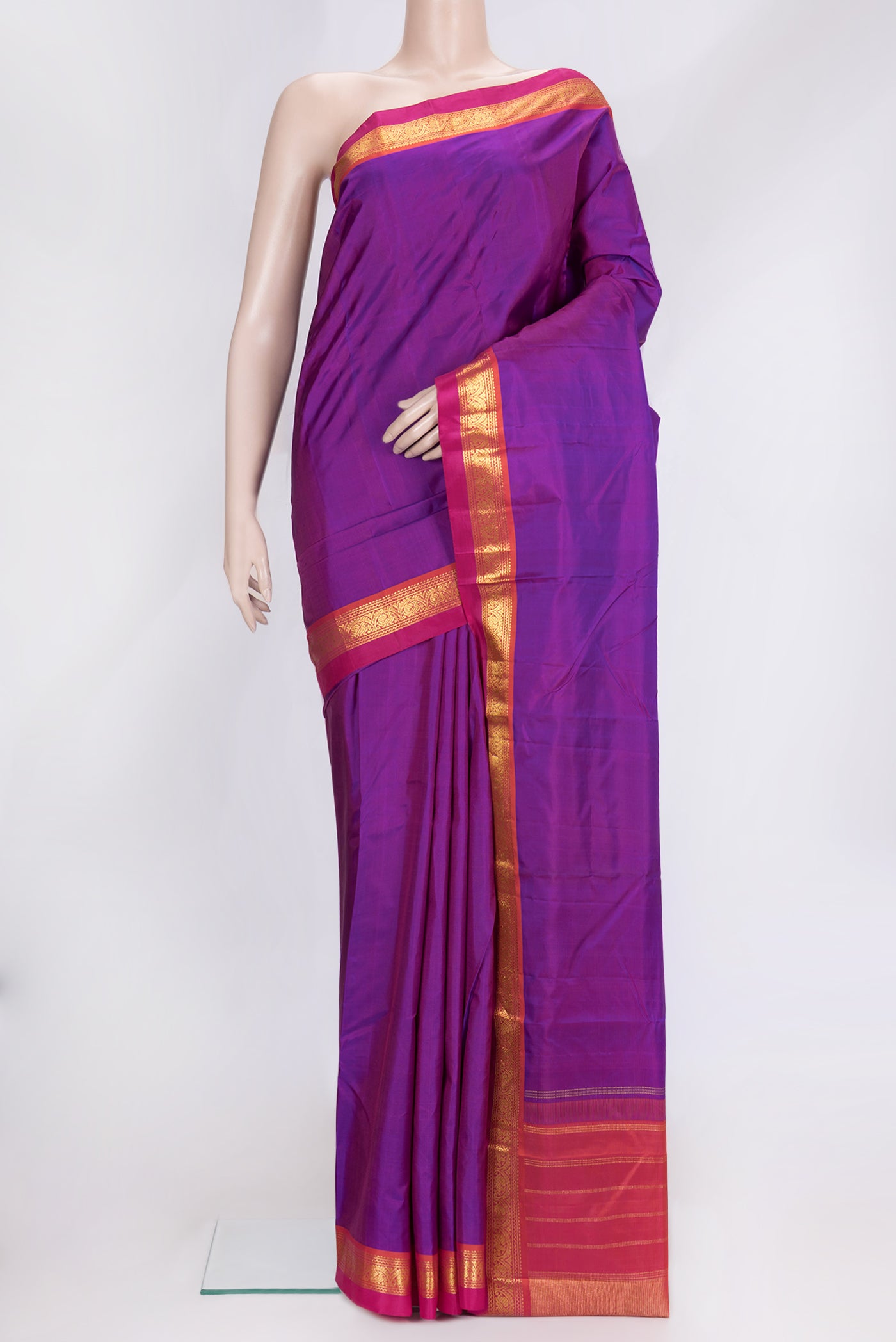 Purple Dual Tone Kanchipuram Silk Saree with Plain Body and Zari Border.  displayed on a mannequin
