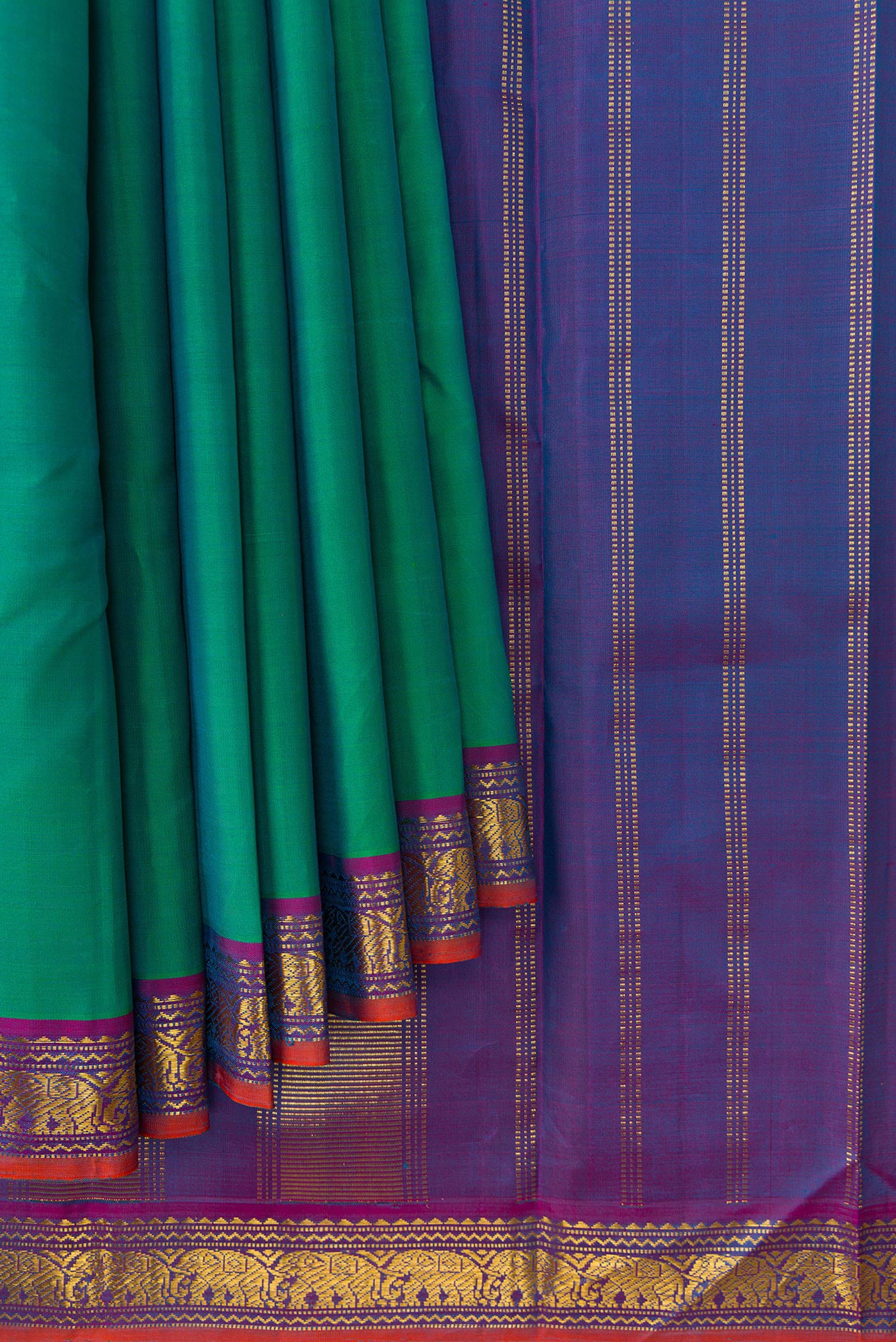 Pleats and pallu of Pure Silk Pure Zari Green Dual Tone Kanchipuram Saree with Plain Body and Zari Border. 