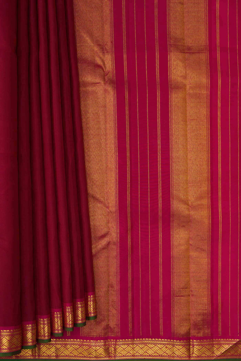 Pleats and pallu of Maroon Dual Tone Kanchipuram Silk Saree with Plain Body and Zari Border. 