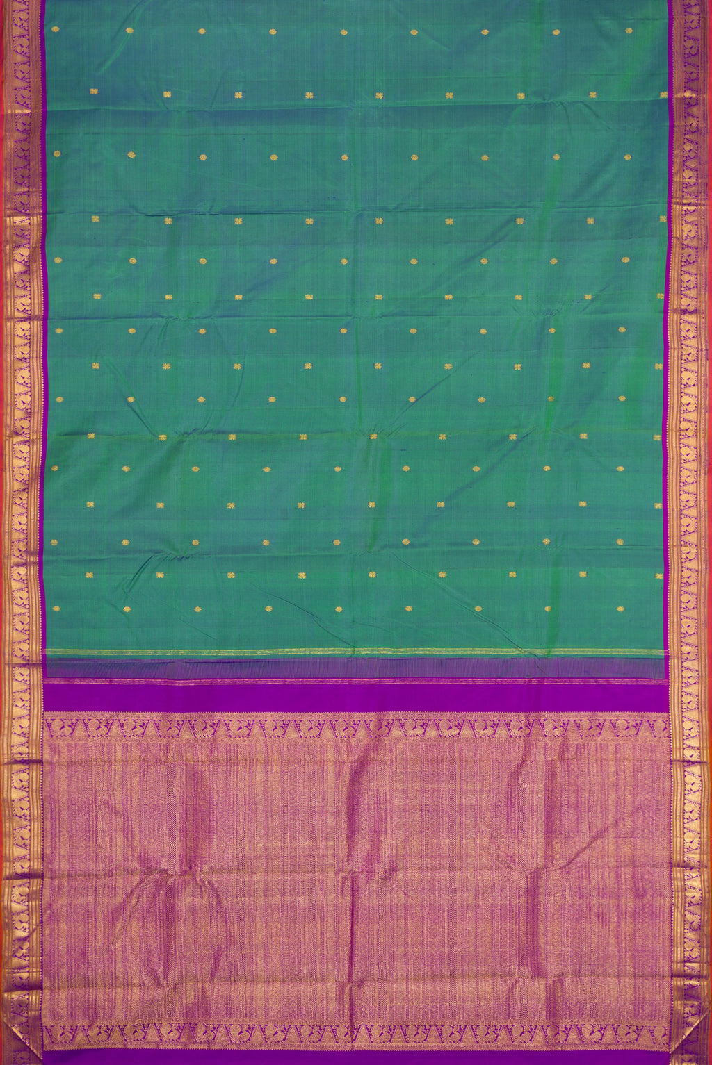 Flat view of Peacock Blue Dual Tone Kanchipuram Silk Saree with Zari Butta on the body and Zari Border. 