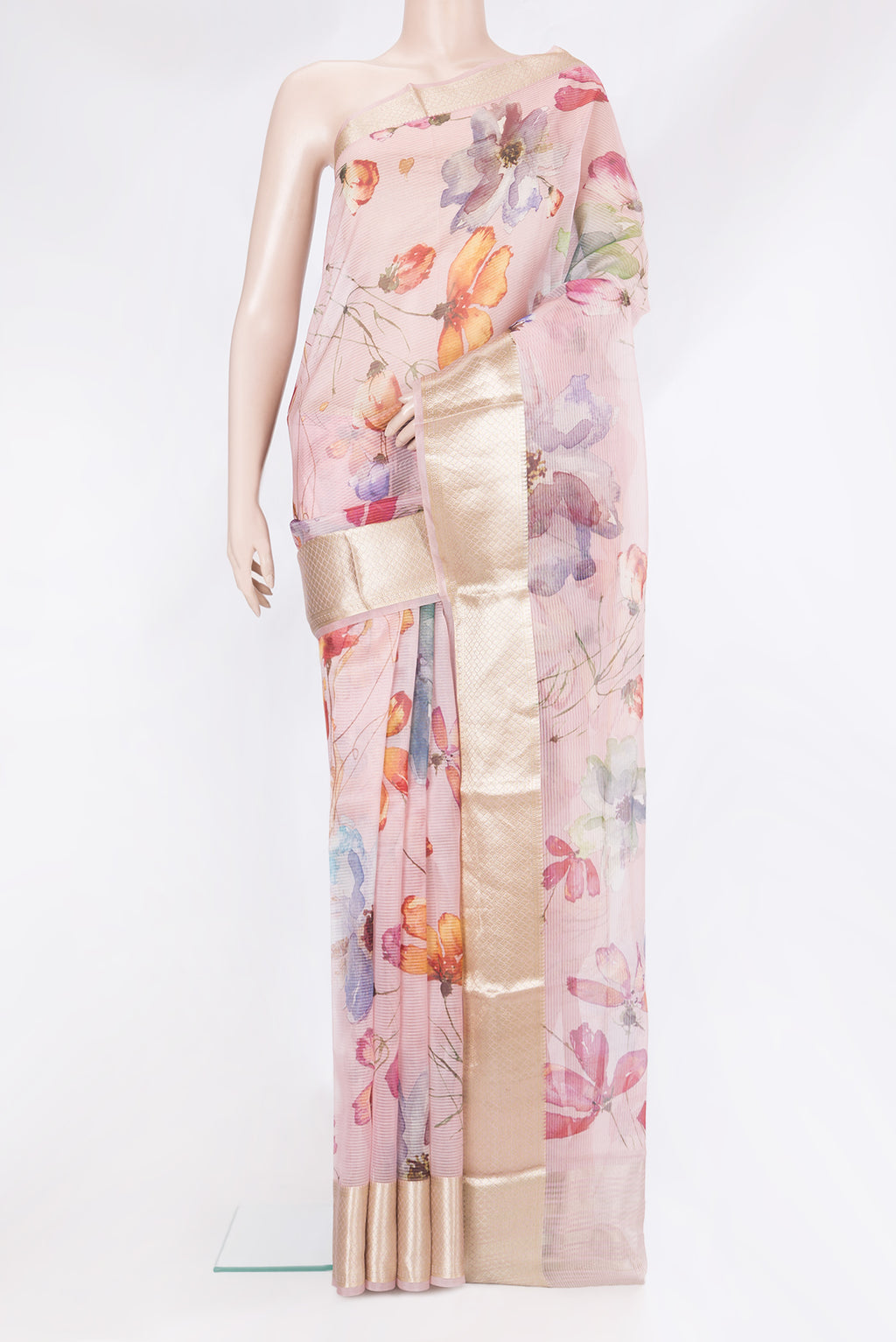 Rose pink Organza Silk Saree with Floral Print on the body and Zari Border.  displayed on a mannequin