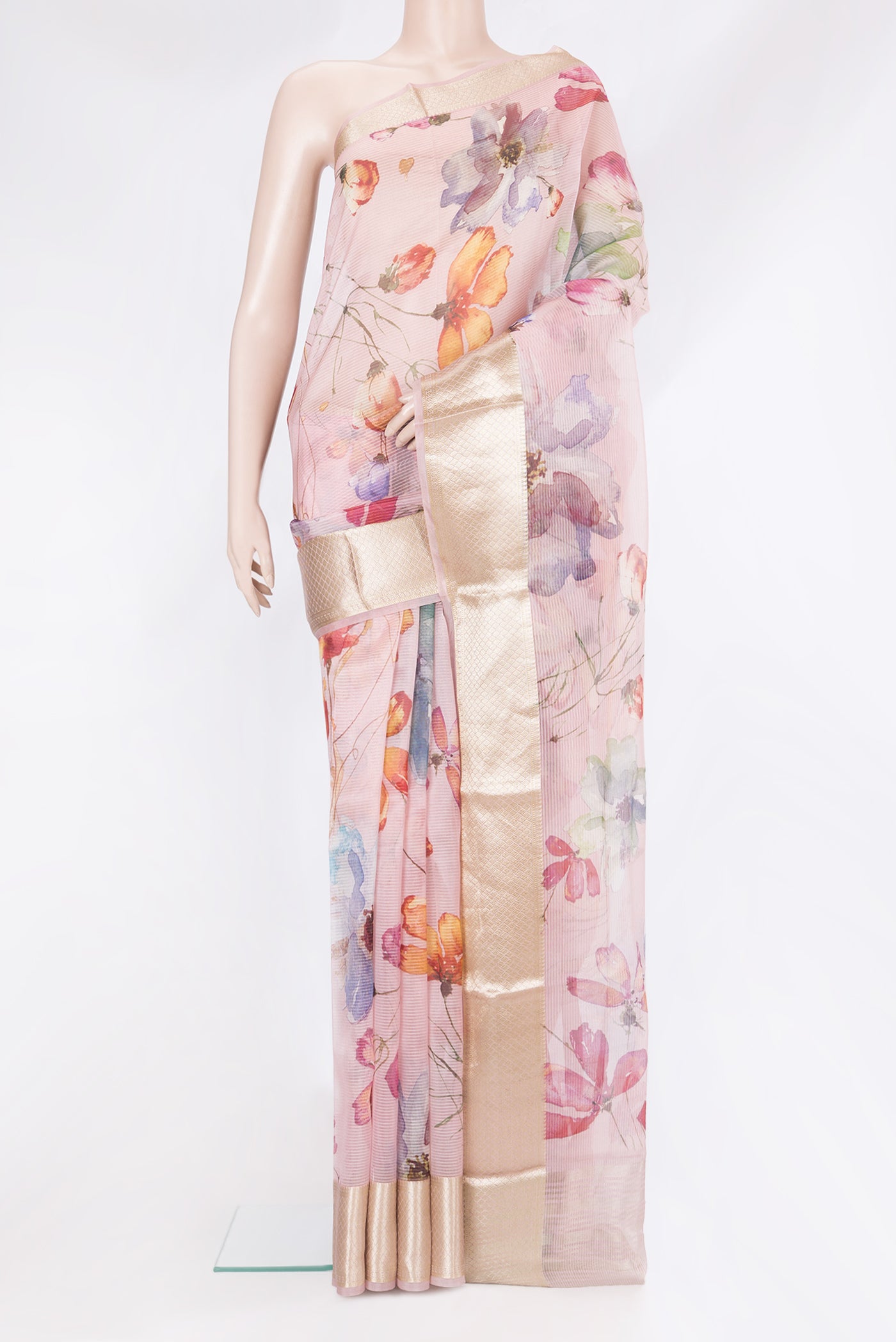 Rose pink Organza Silk Saree with Floral Print on the body and Zari Border.  displayed on a mannequin