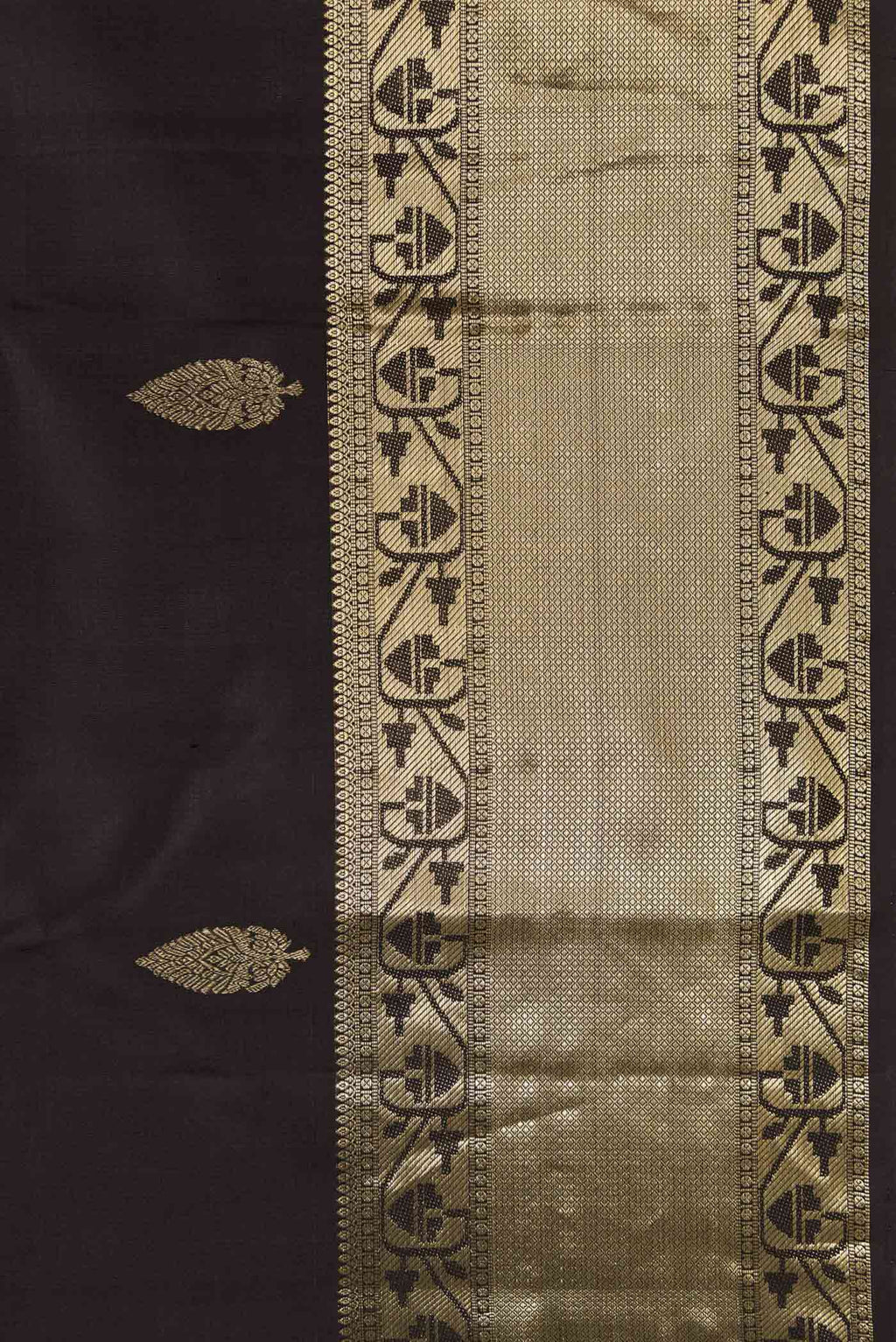 Border image of Black Dual Tone Kanchipuram Silk Saree with Zari Butta on the body and Zari Border. 