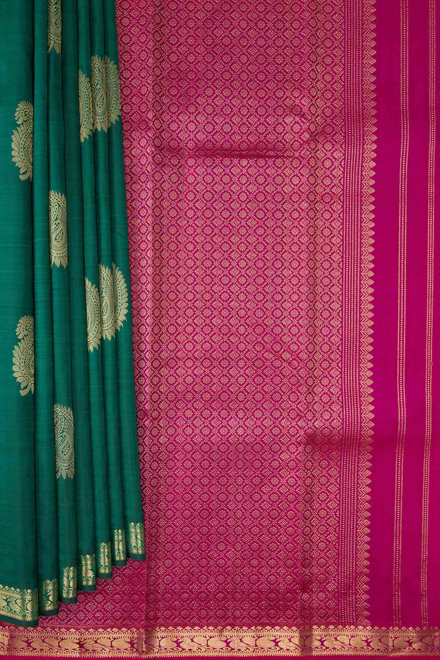 Pleats and pallu of Bottle Green Dual Tone Kanchipuram Silk Saree with Zari Butta on the body and Zari Border. 