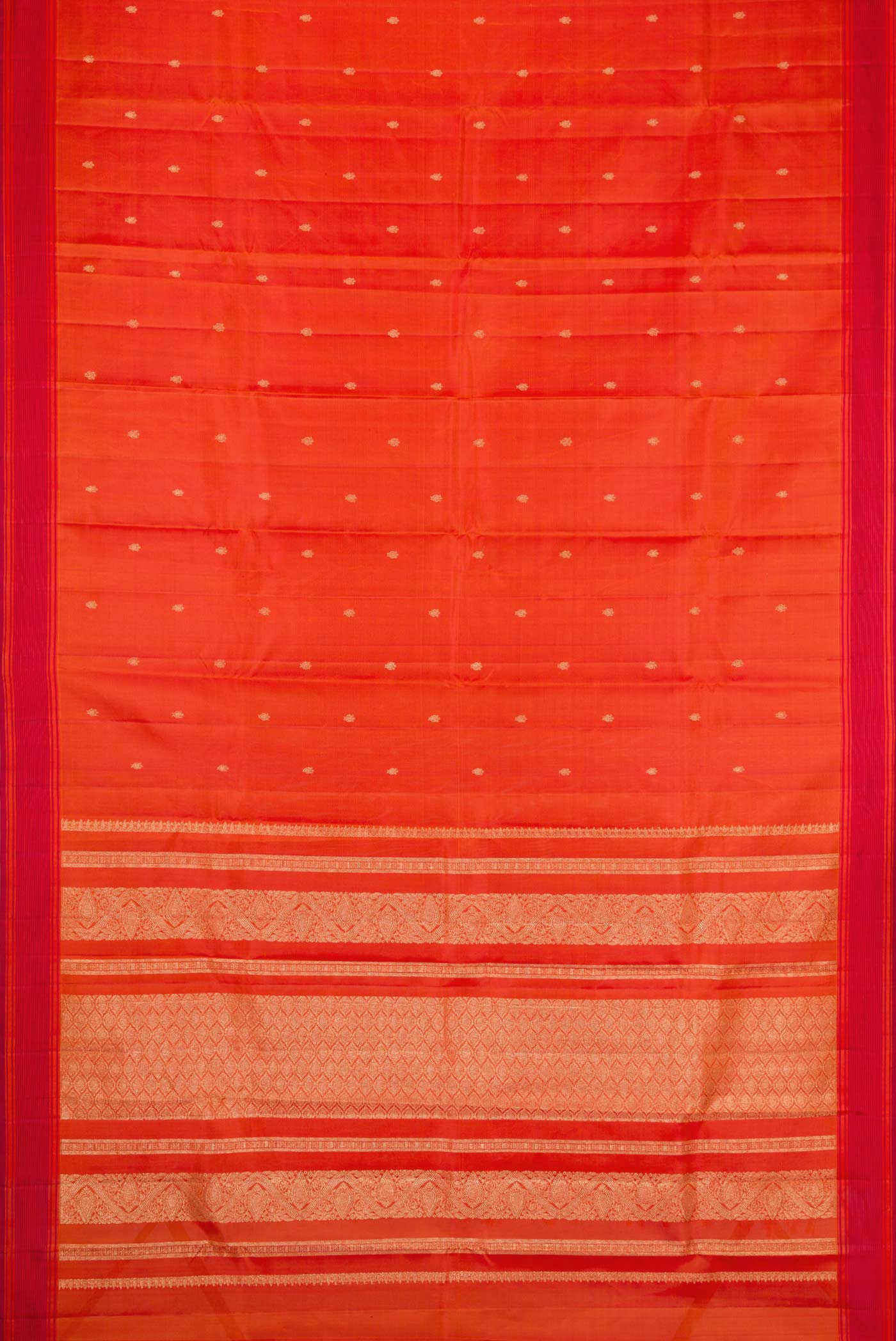 Flat view of Orange Dual Tone Kanchipuram Silk Saree with Zari Butta on the body and Thread Border. 