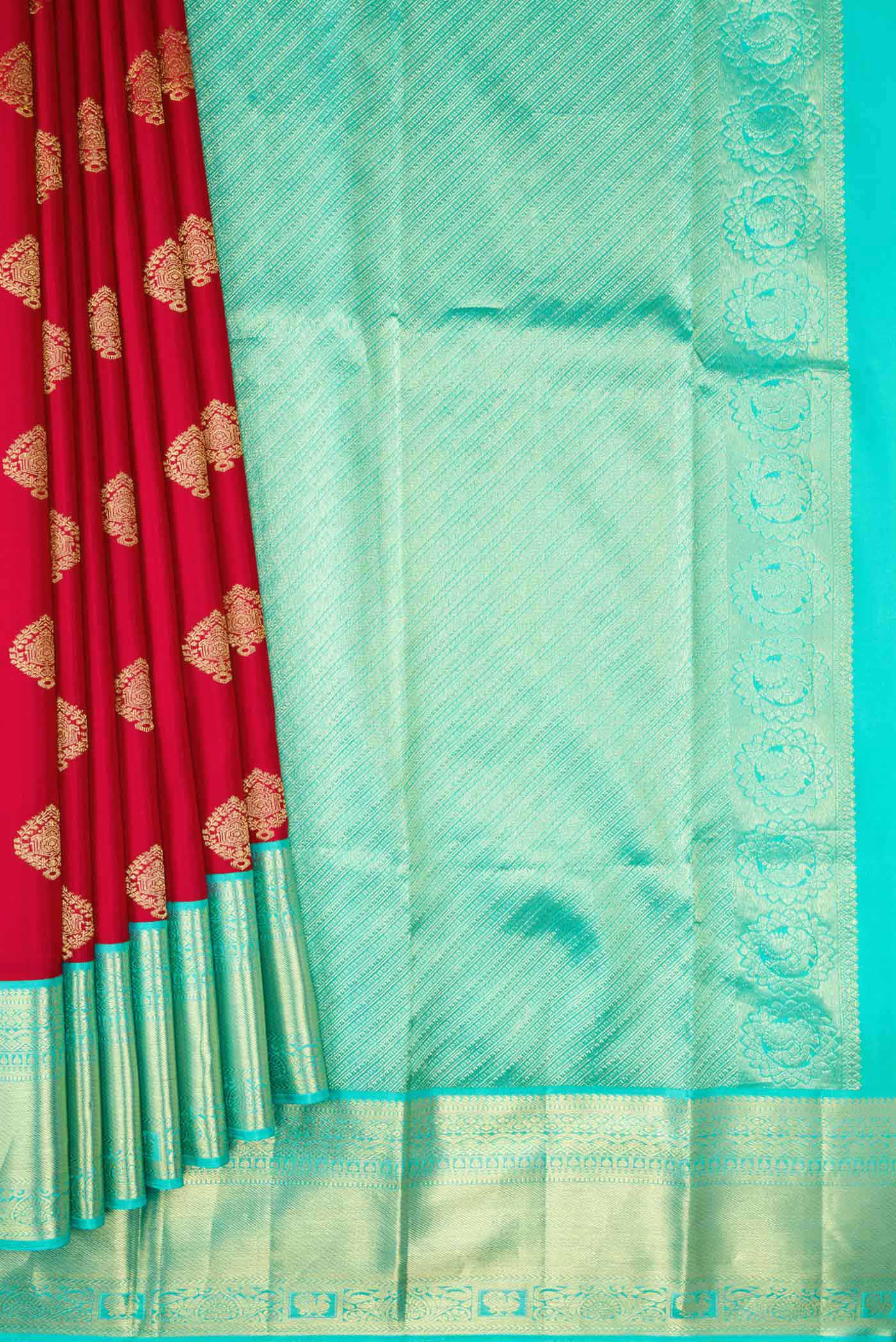 Pleats and pallu of Red Dual Tone Kanjivaram Silk Saree with Zari Butta on the body and Zari Border. 