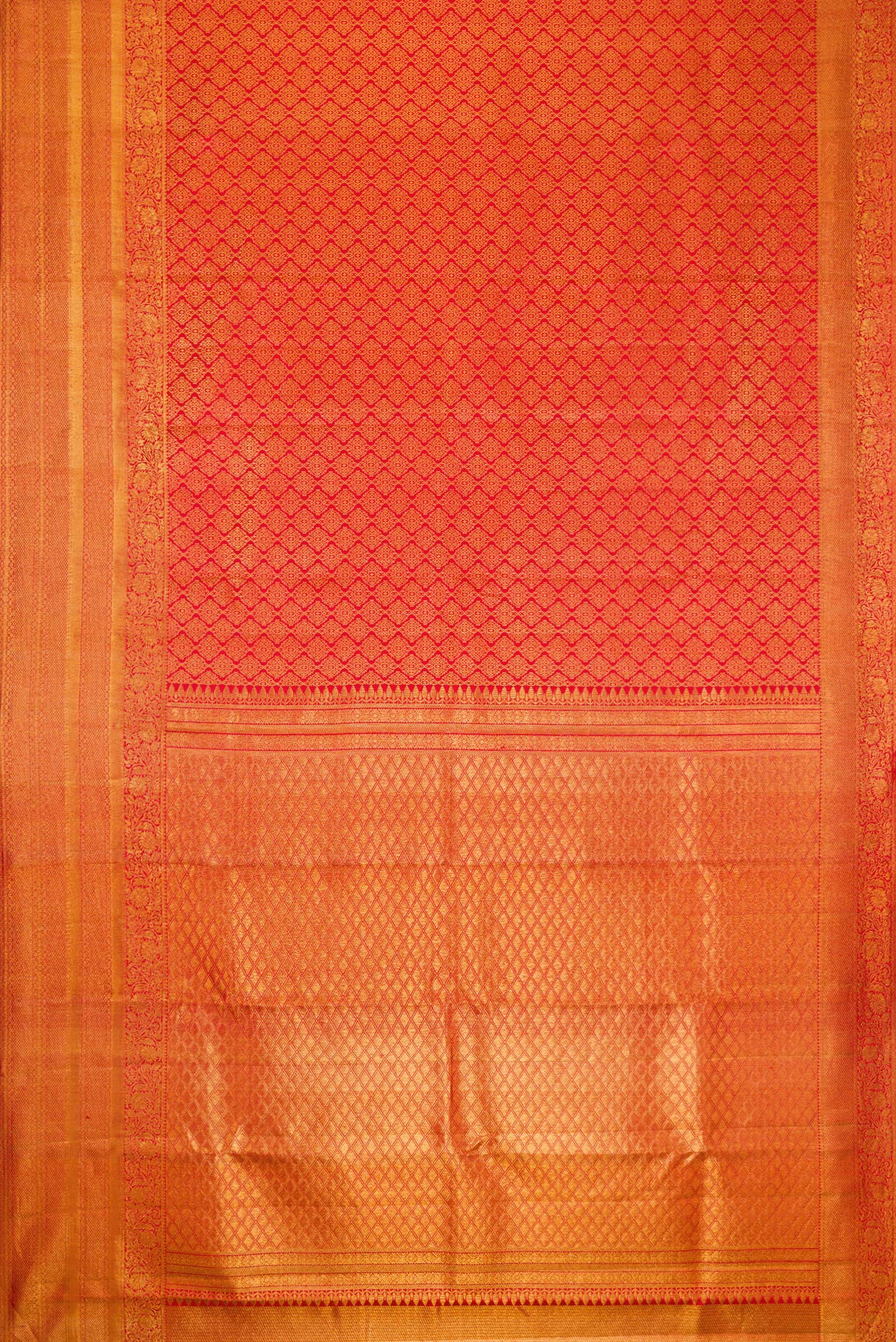 Flat view of Red Dual Tone Kanjivaram Silk Saree with Zari Brocade on the body and Fancy Border. 