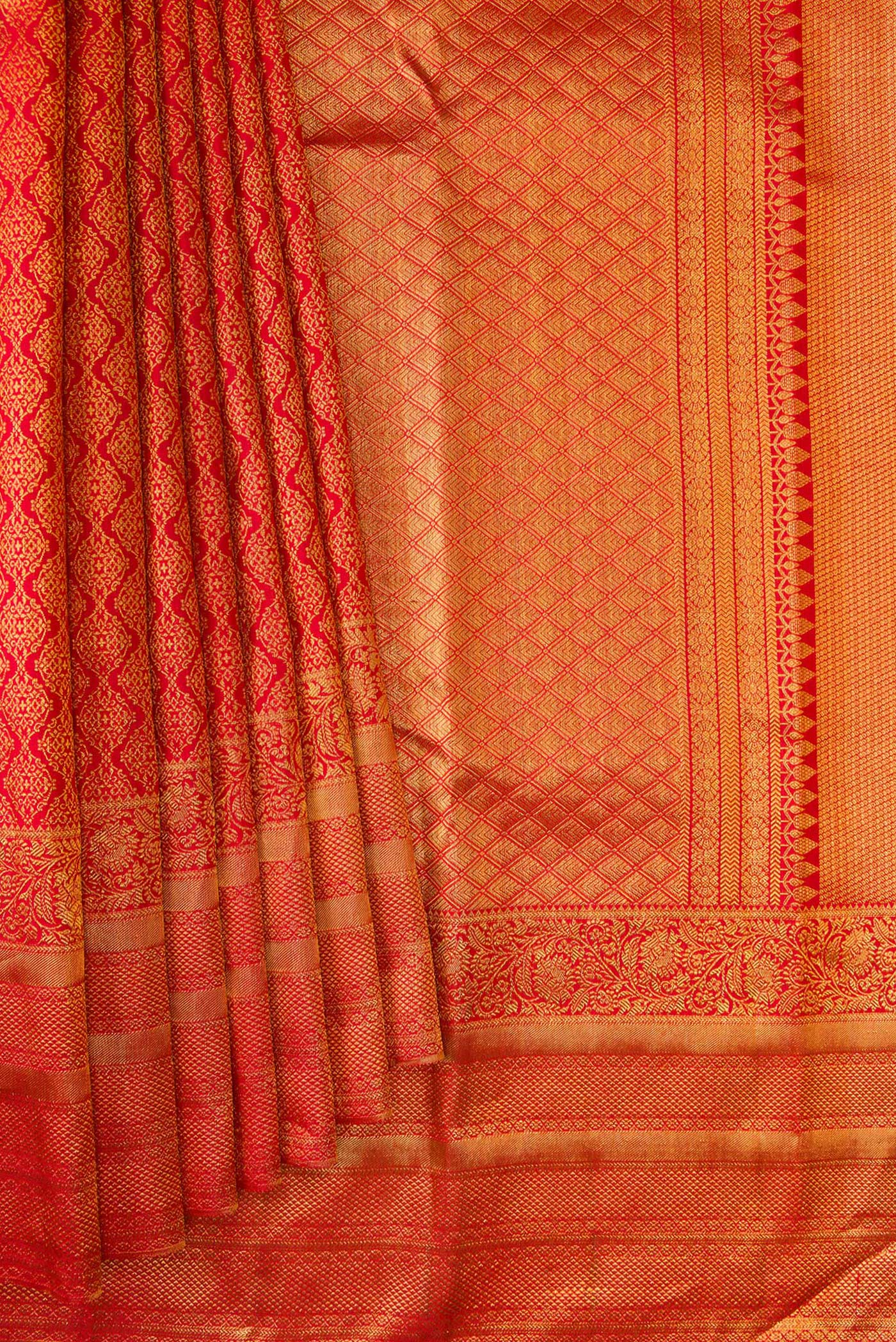 Pleats and pallu of Red Dual Tone Kanjivaram Silk Saree with Zari Brocade on the body and Fancy Border. 