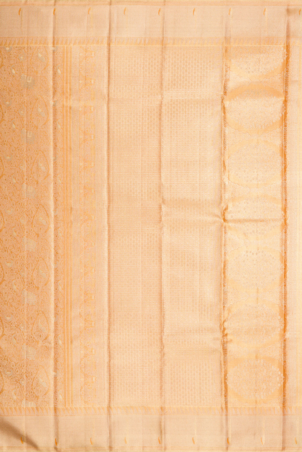 Close up image of the pallu of Golden Peach Dual Tone Kanjivaram Tissue Silk Saree with Zari Brocade on the body and Zari Border. 