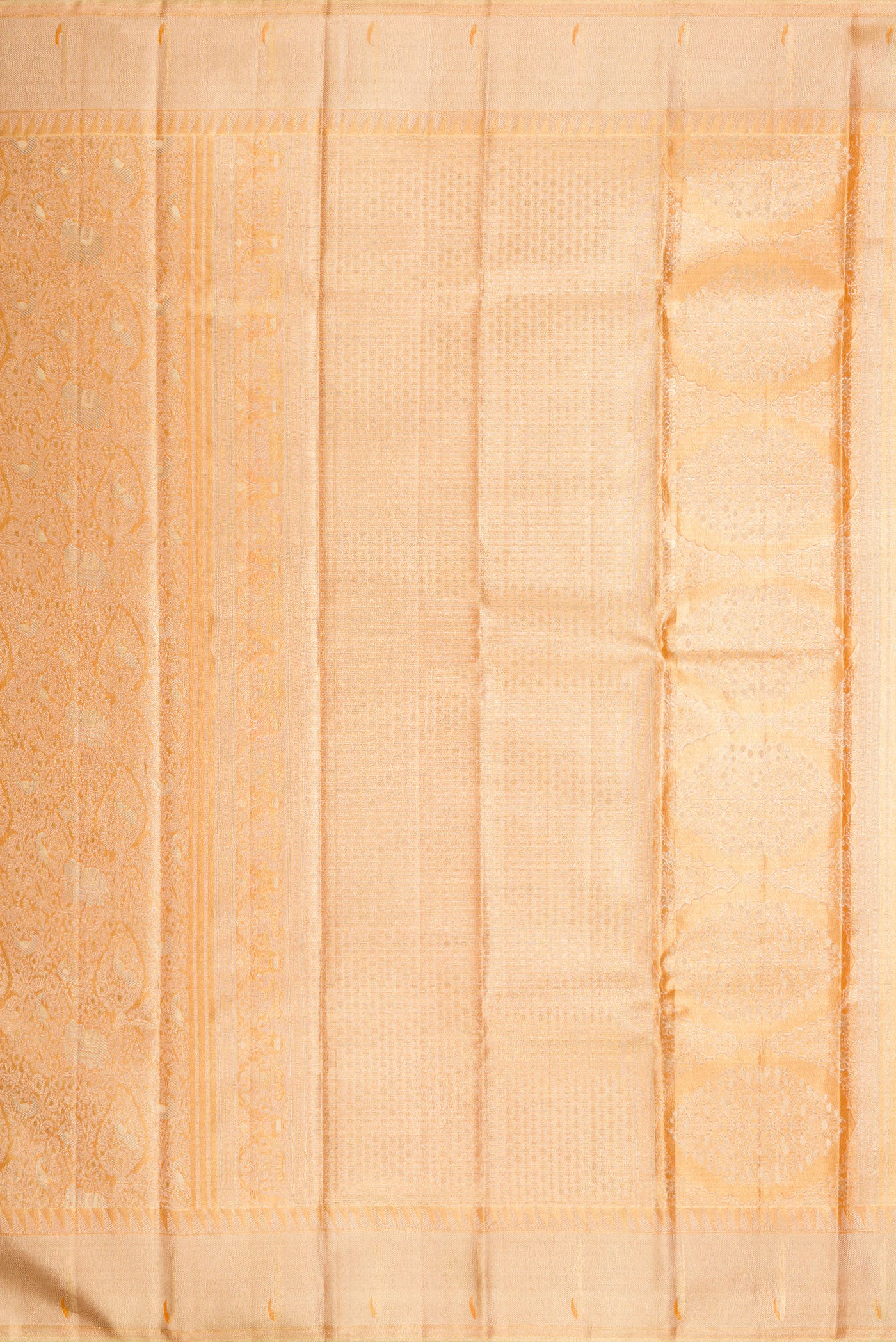 Close up image of the pallu of Golden Peach Dual Tone Kanjivaram Tissue Silk Saree with Zari Brocade on the body and Zari Border. 