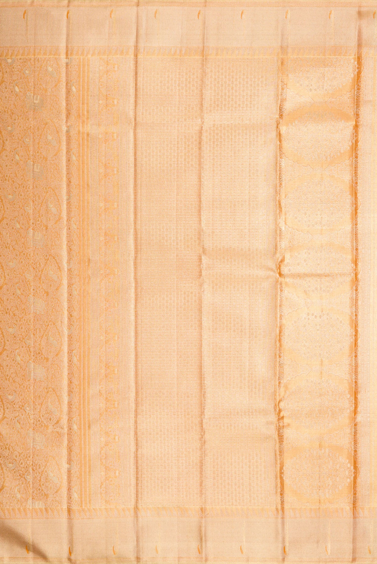 Close up image of the pallu of Golden Peach Dual Tone Kanjivaram Tissue Silk Saree with Zari Brocade on the body and Zari Border. 