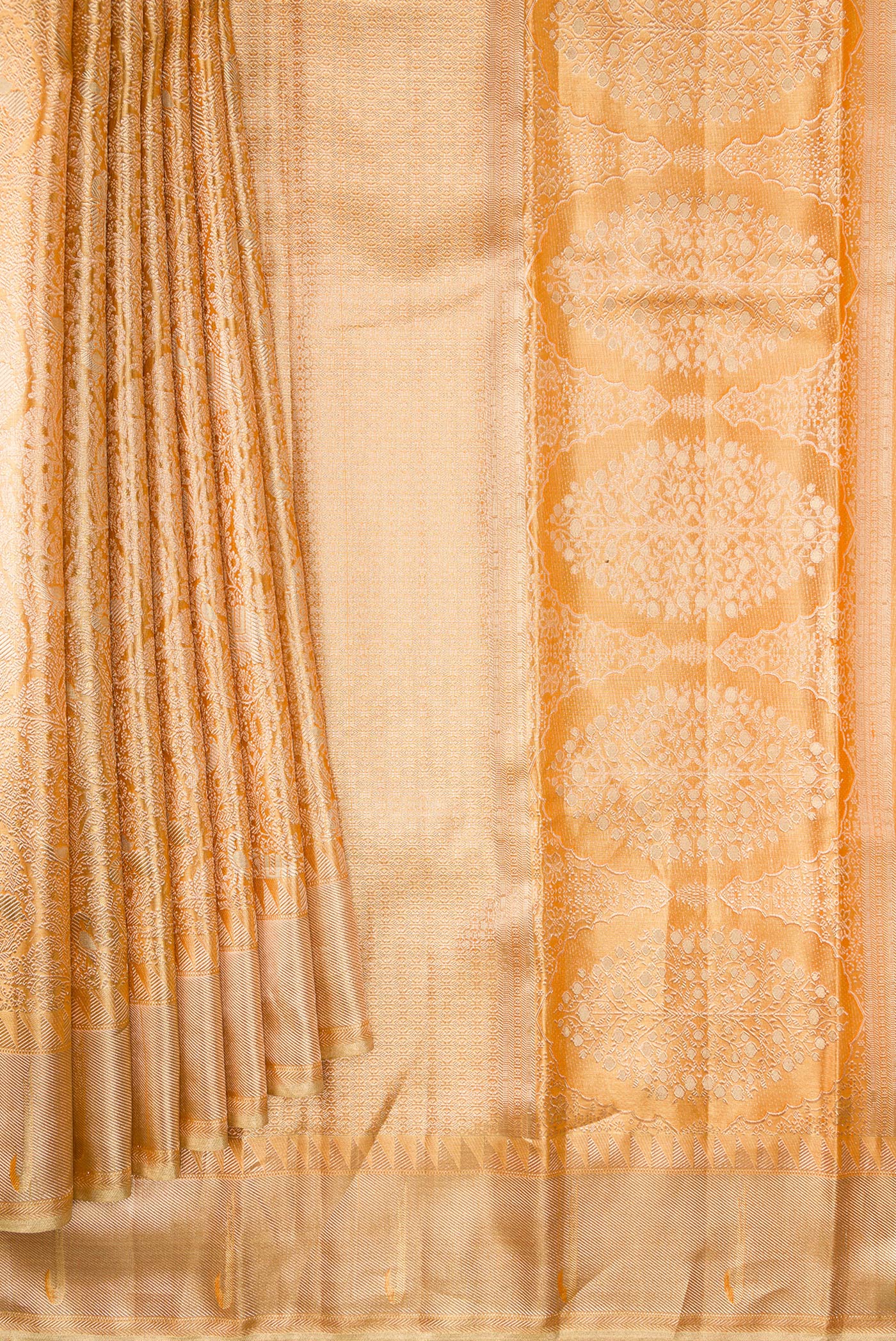 Pleats and pallu of Golden Peach Dual Tone Kanjivaram Tissue Silk Saree with Zari Brocade on the body and Zari Border. 