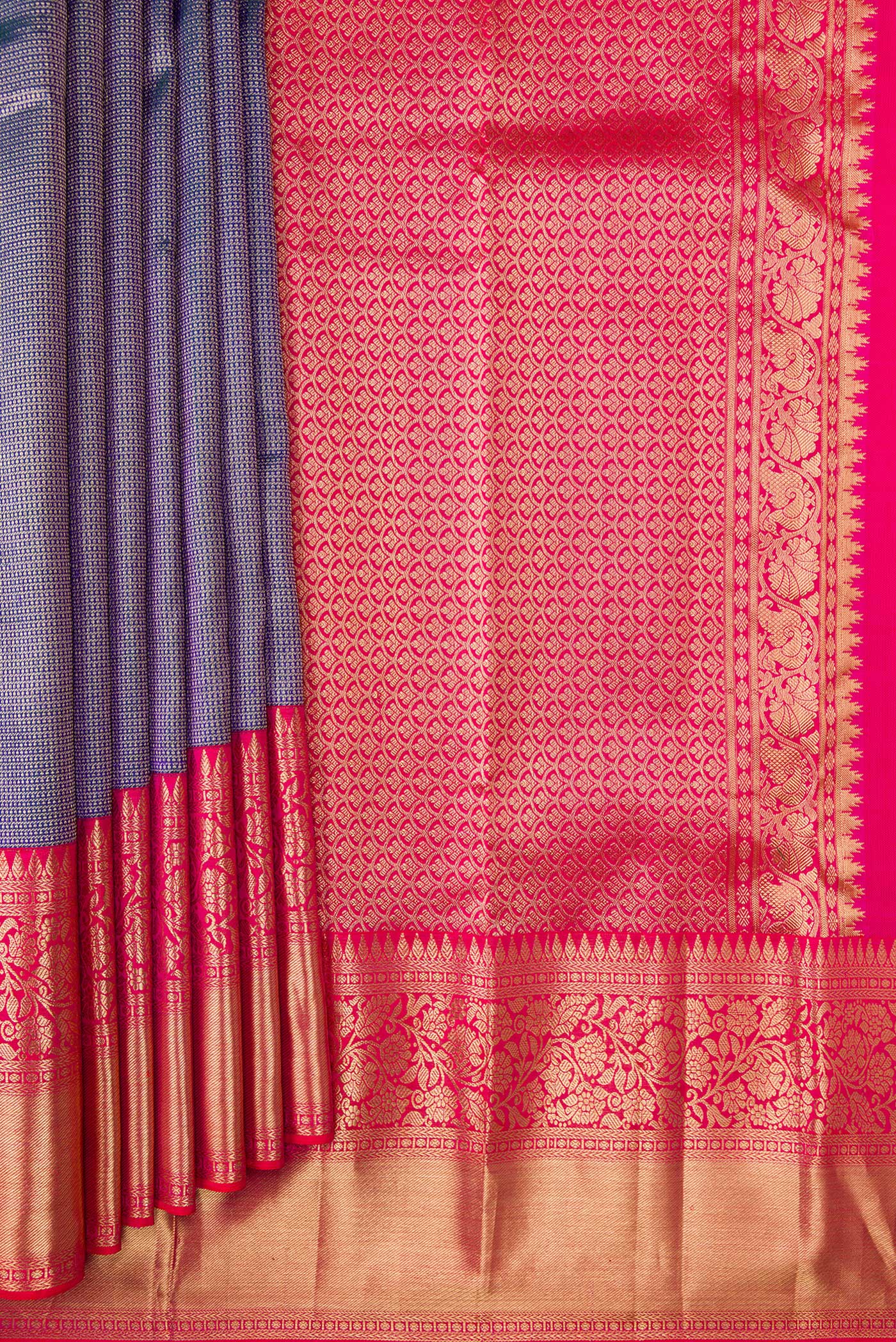 Pleats and pallu of Peacock Blue Dual Tone Kanjivaram Silk Saree with Zari Brocade on the body and Zari Border. 