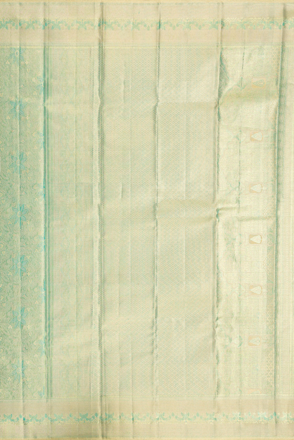 Close up image of the pallu of Green Dual Tone Kanjivaram Tissue Silk Saree with Zari Brocade on the body and Zari Border. 