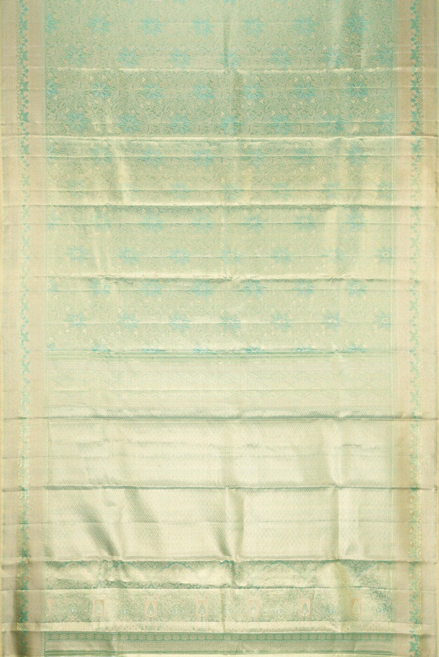 Flat view of Green Dual Tone Kanjivaram Tissue Silk Saree with Zari Brocade on the body and Zari Border. 