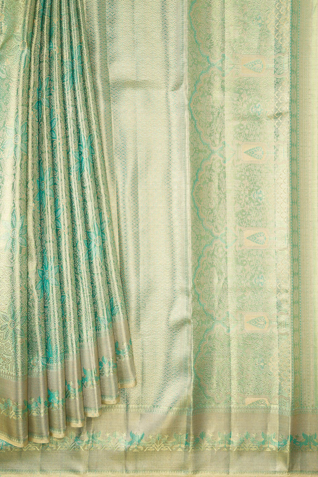 Pleats and pallu of Green Dual Tone Kanjivaram Tissue Silk Saree with Zari Brocade on the body and Zari Border. 