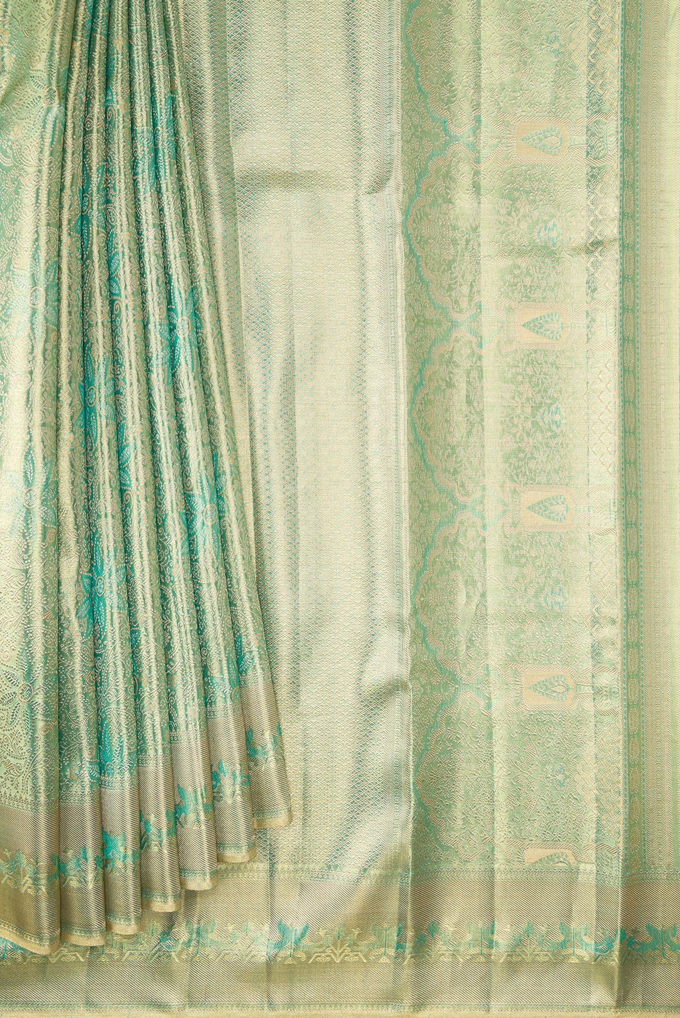 Pleats and pallu of Green Dual Tone Kanjivaram Tissue Silk Saree with Zari Brocade on the body and Zari Border. 