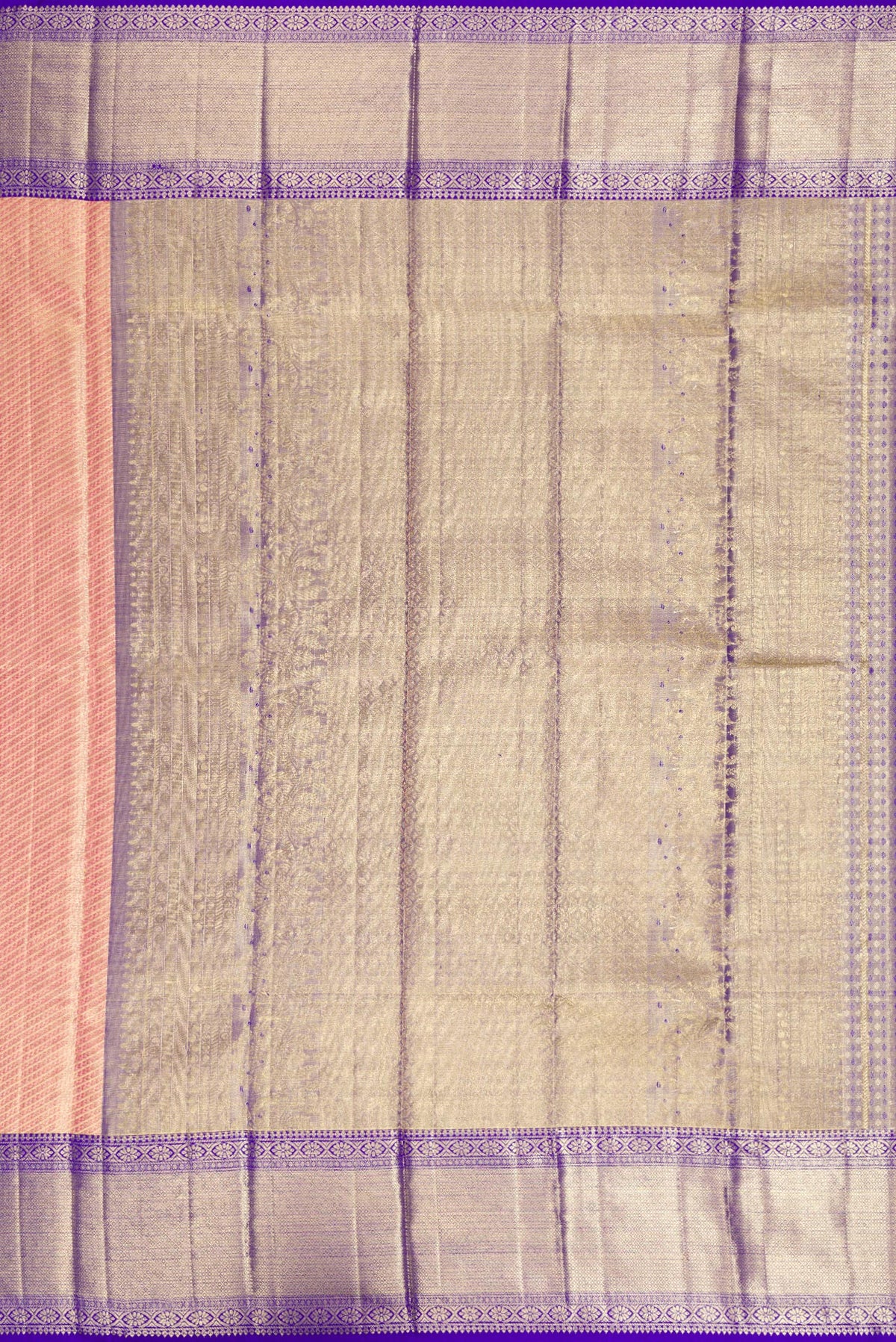 Close up image of the pallu of Golden Peach Dual Tone Kanjivaram Tissue Silk Saree with Zari Brocade on the body and Zari Border. 
