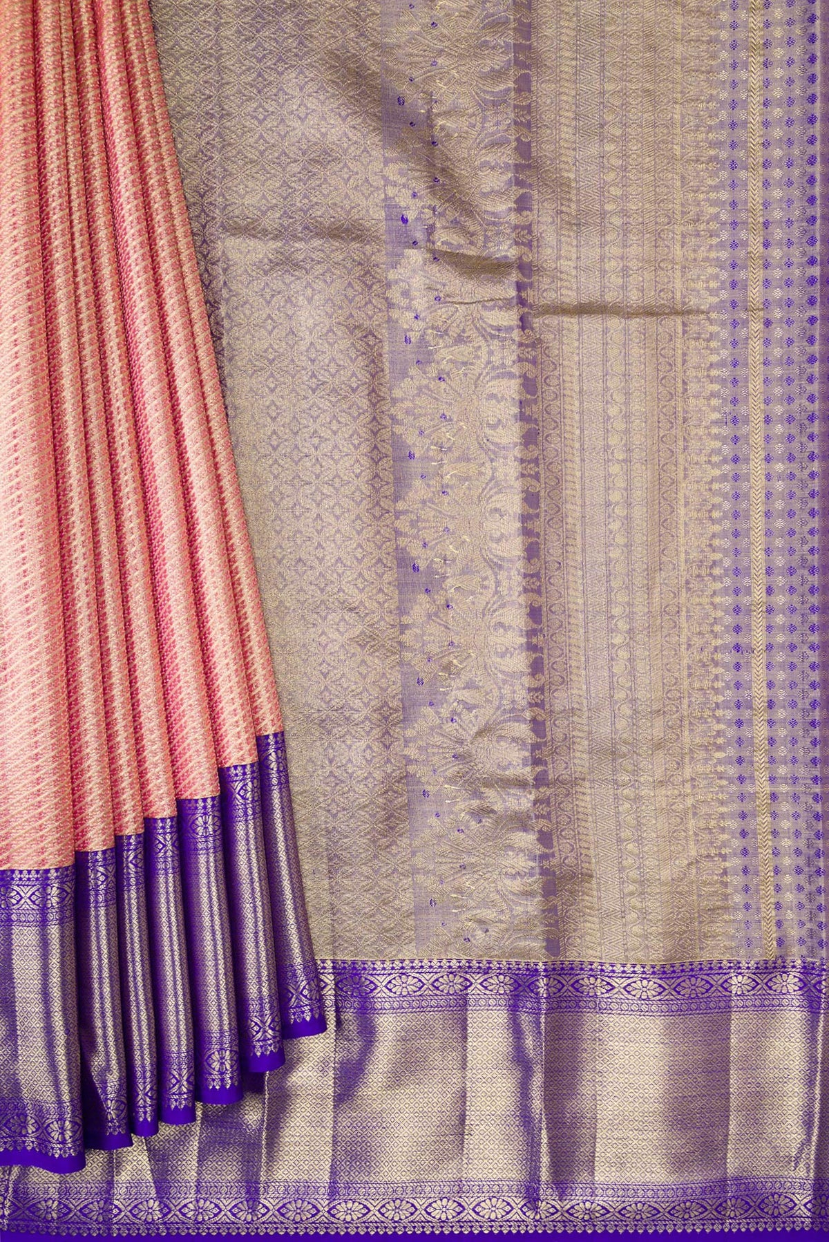 Pleats and pallu of Golden Peach Dual Tone Kanjivaram Tissue Silk Saree with Zari Brocade on the body and Zari Border. 
