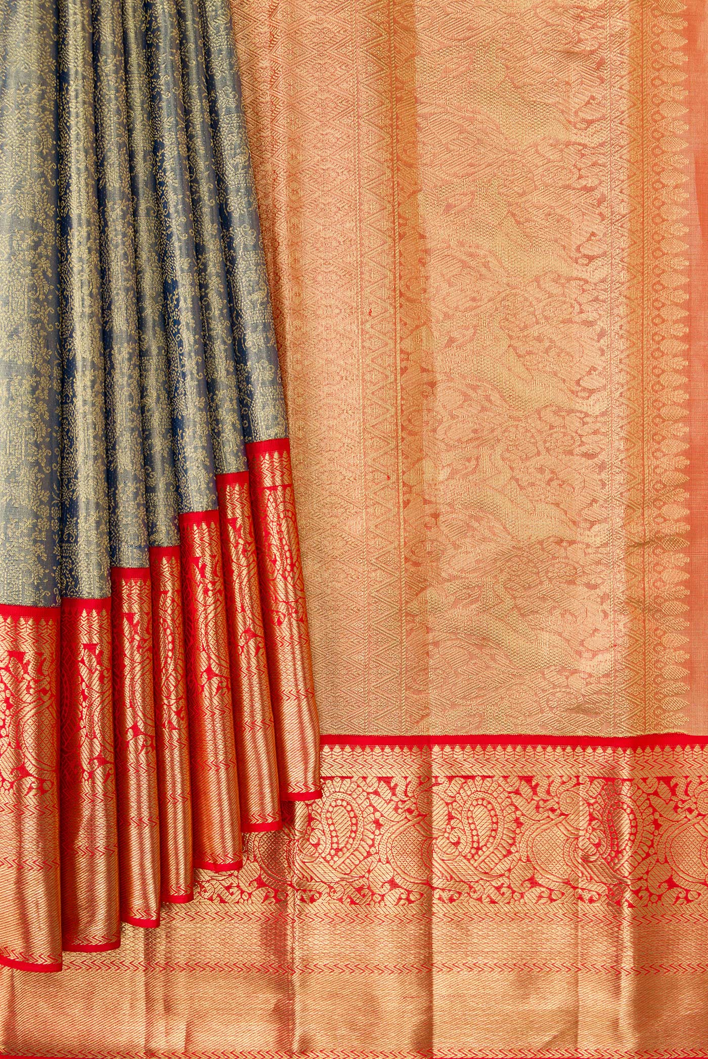Pleats and pallu of Green Dual Tone Kanjivaram Tissue Silk Saree with Zari Brocade on the body and Zari Border. 
